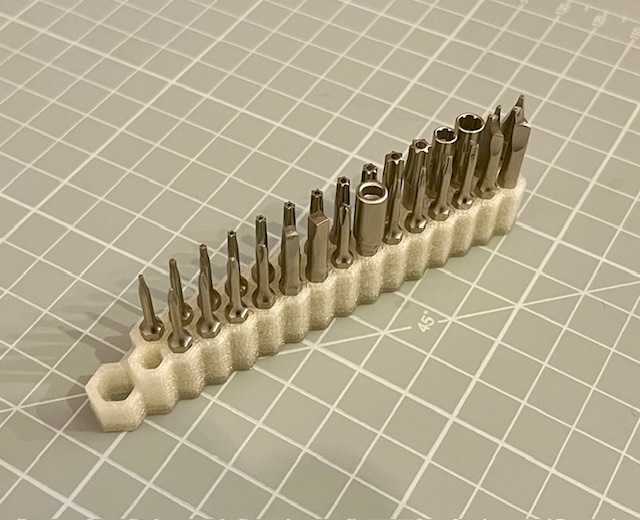 Compact bit holder for 4mm screwdriver bits by Drew Batchelor