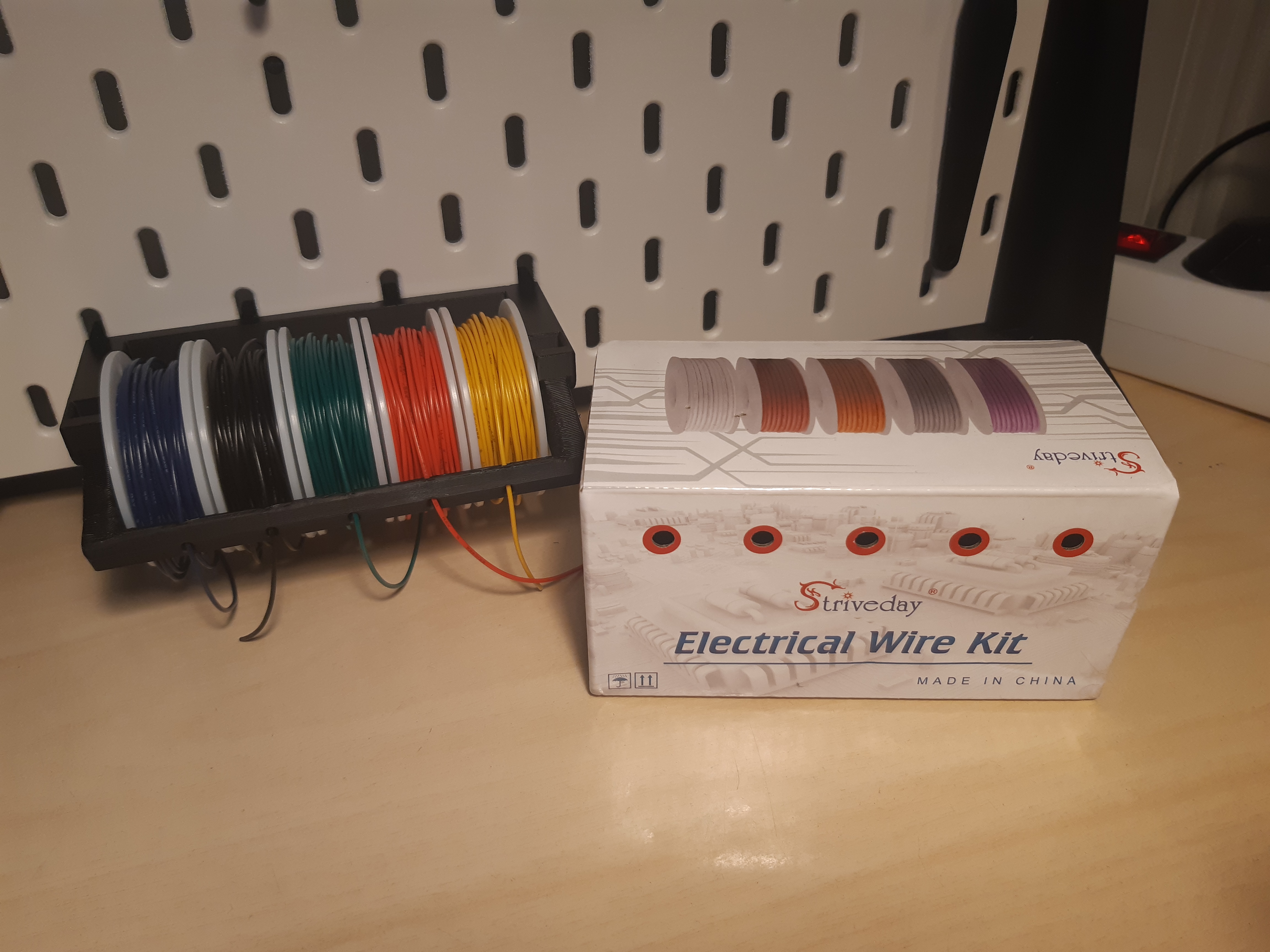 Ikea Skådis Wire spool holder.