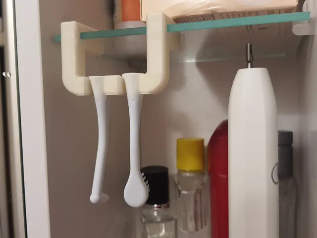 Toothbrush head holder