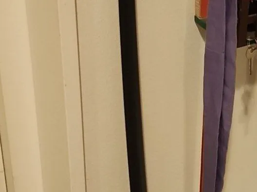 Wall holder for IKEA OMTÄNKSAM shoehorn
