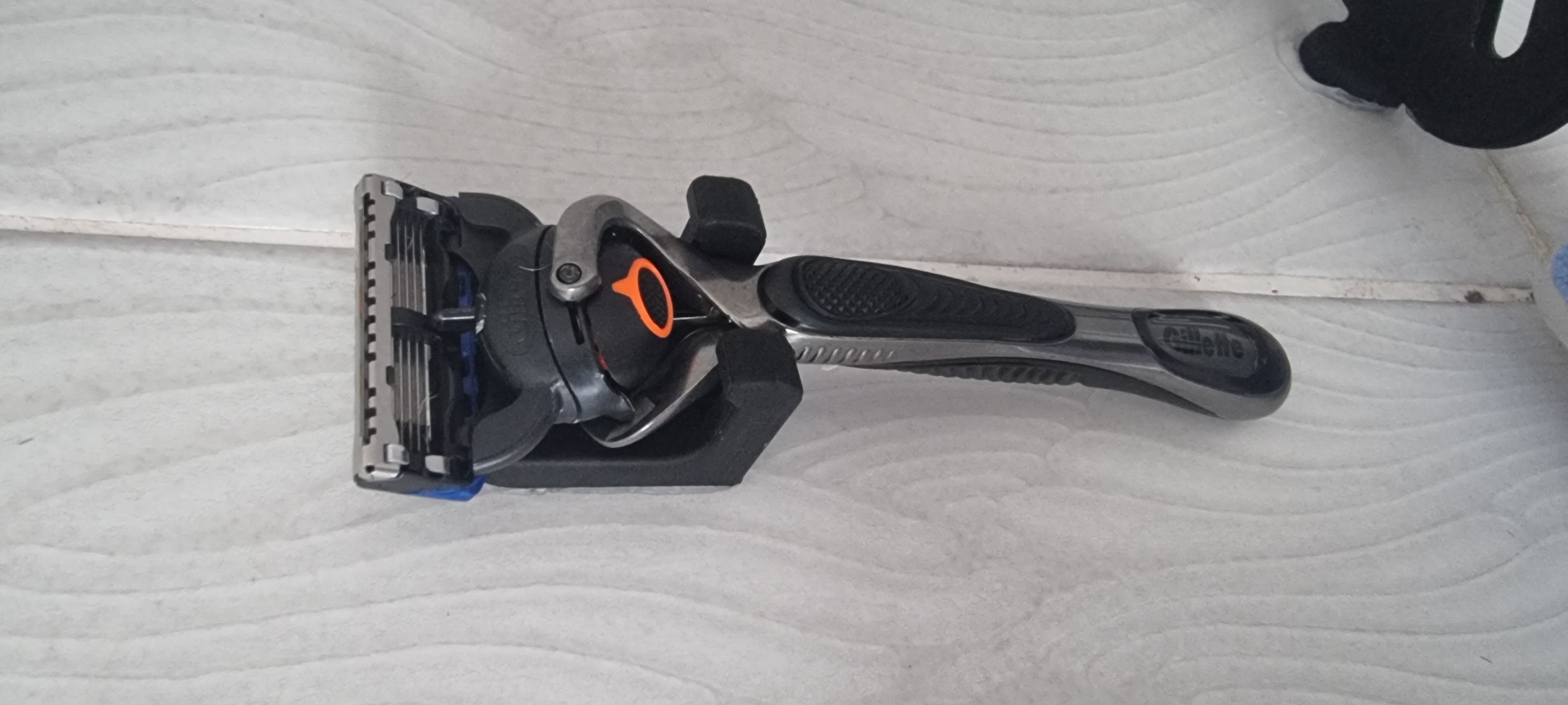 Razer holder. No drilling necessary