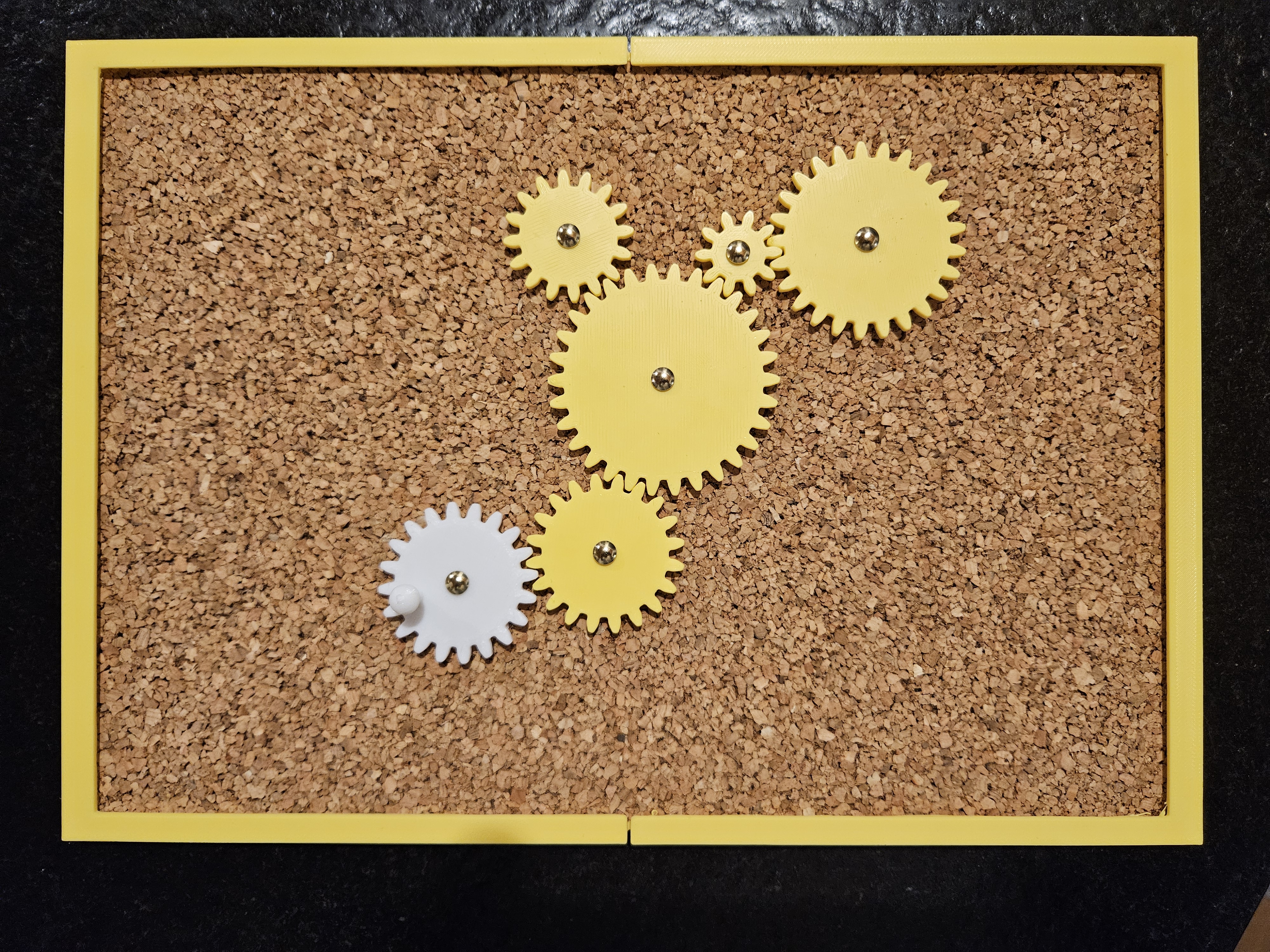 Kid's cork nail game with gears