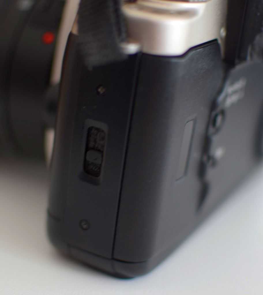 film door latch for Canon EOS 50/50E (Elan/55)