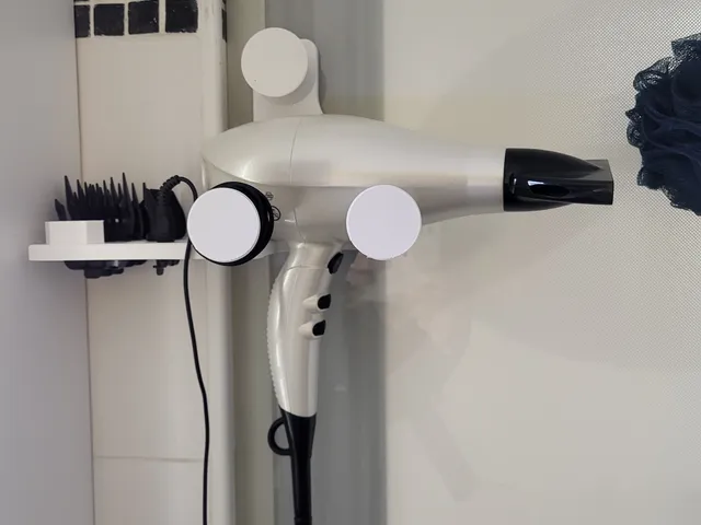 Wall support for my hair dryer and for my razor