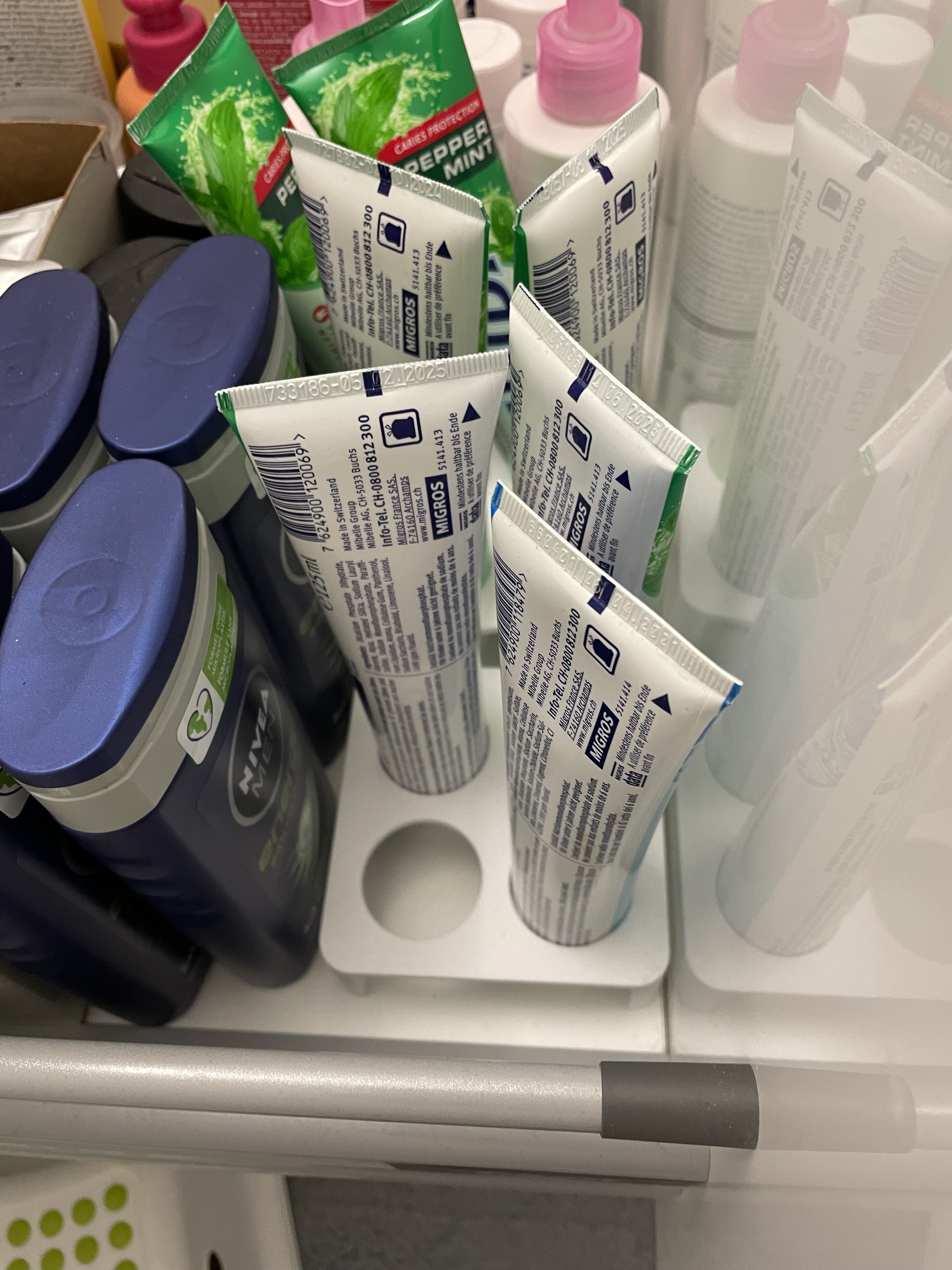 Toothpaste tube holder