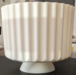 Pot with drainage holes