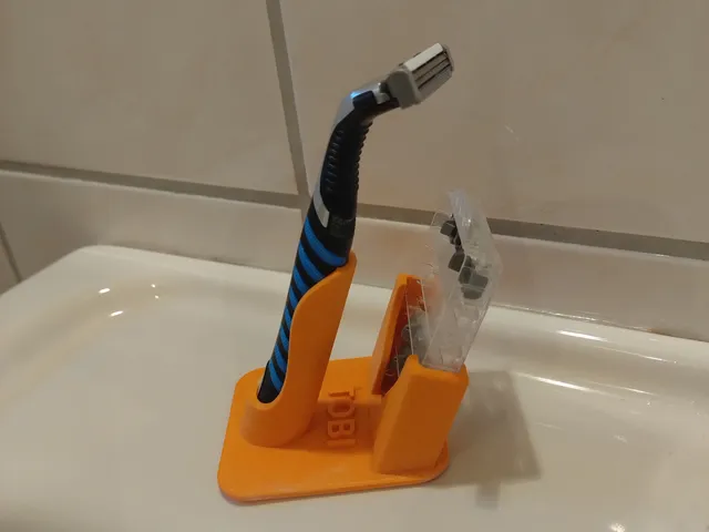 Holder for razor and spare blades