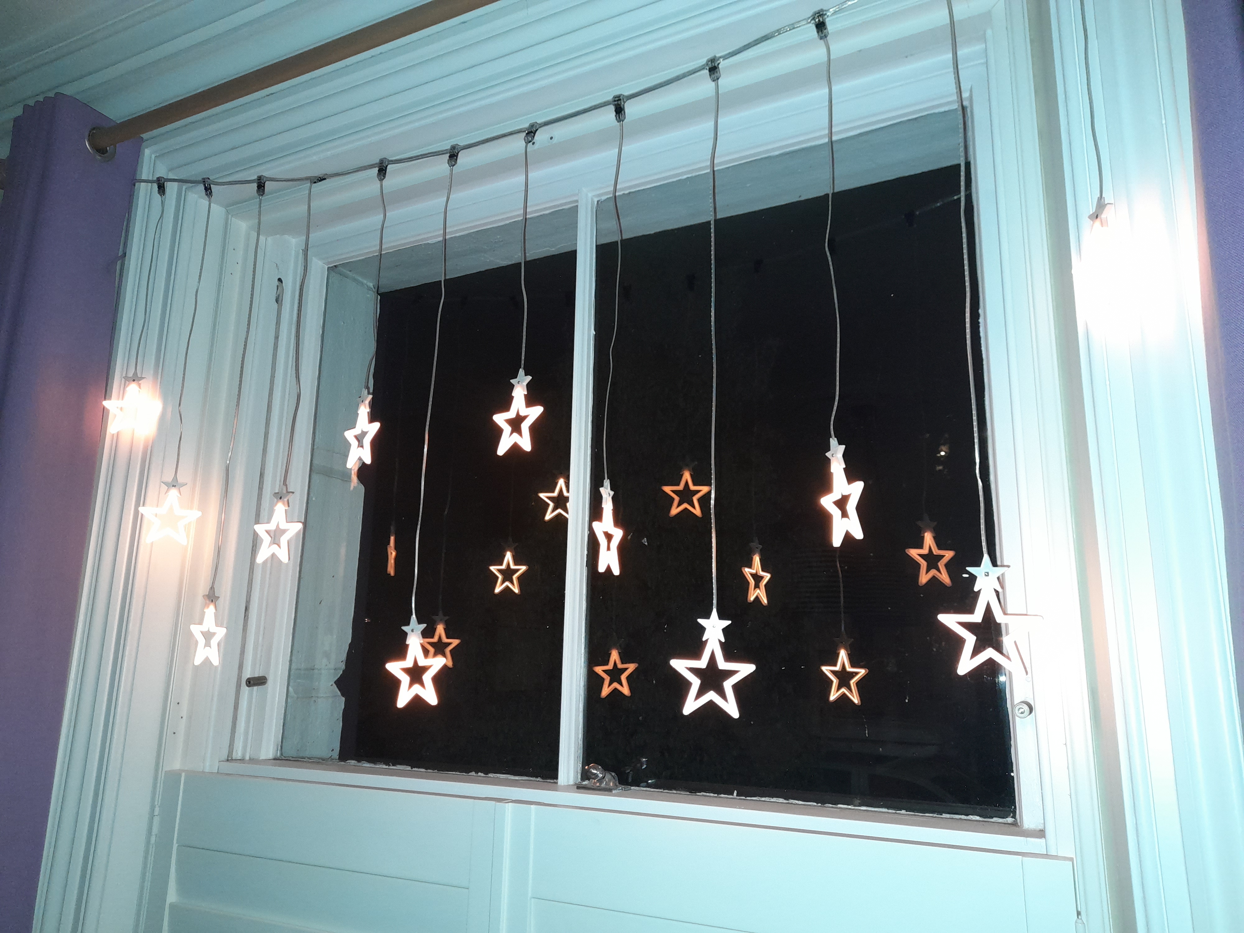 Suspended Christmas star window decoration