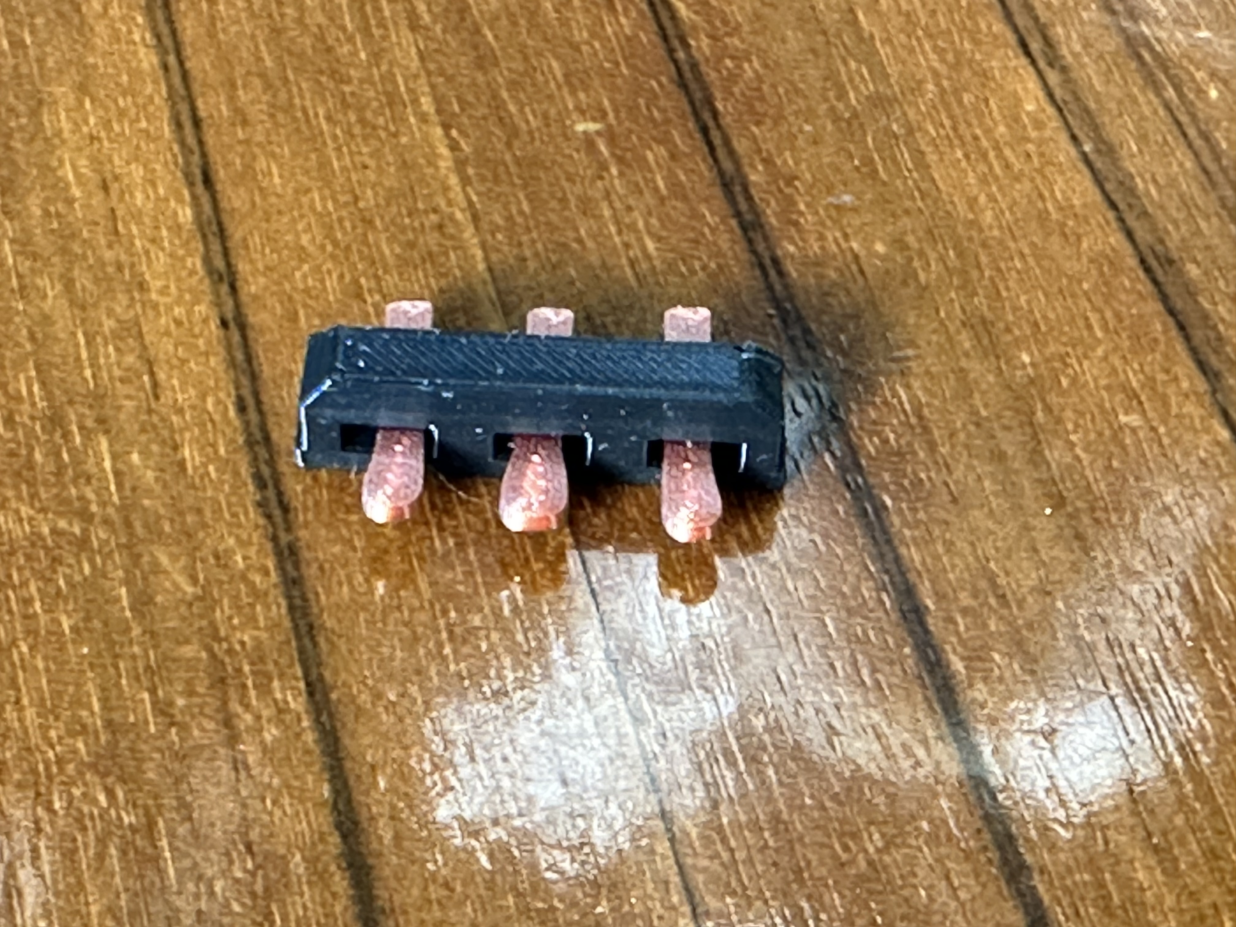 Corrected pedal base for Grand piano with moving parts
