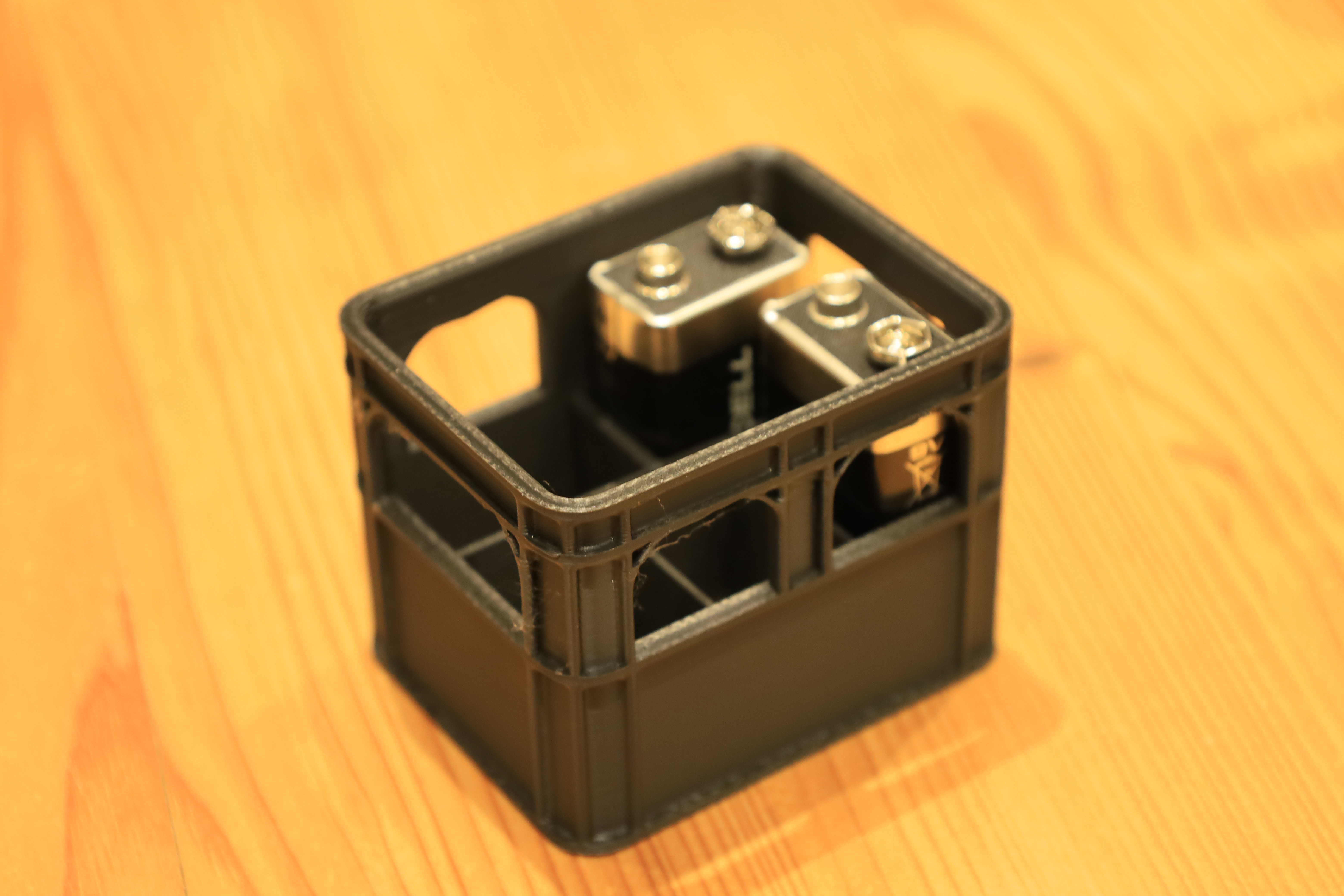 Stackable beer crate for 9V batteries for legs