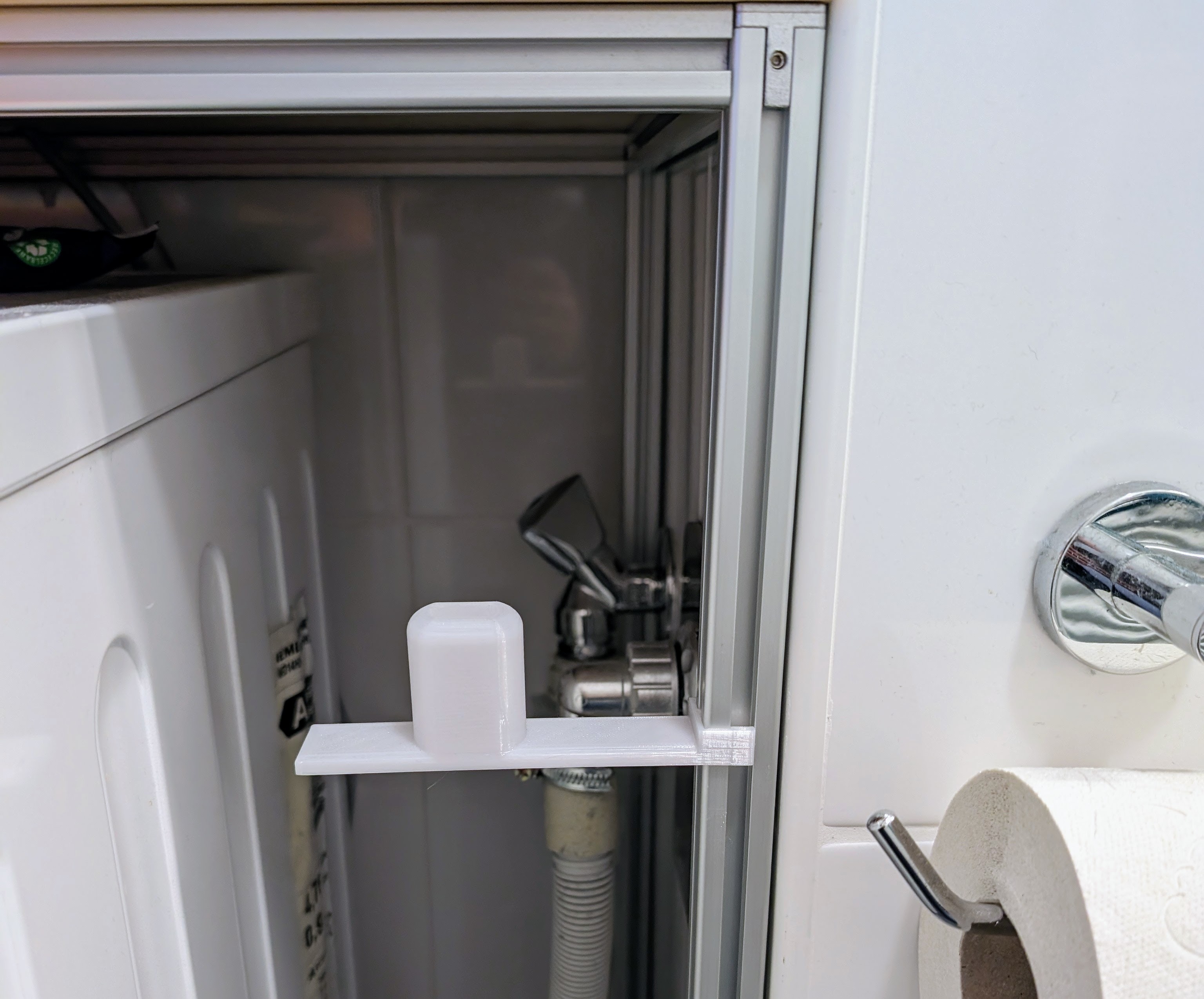 Spare toilet paper shelf