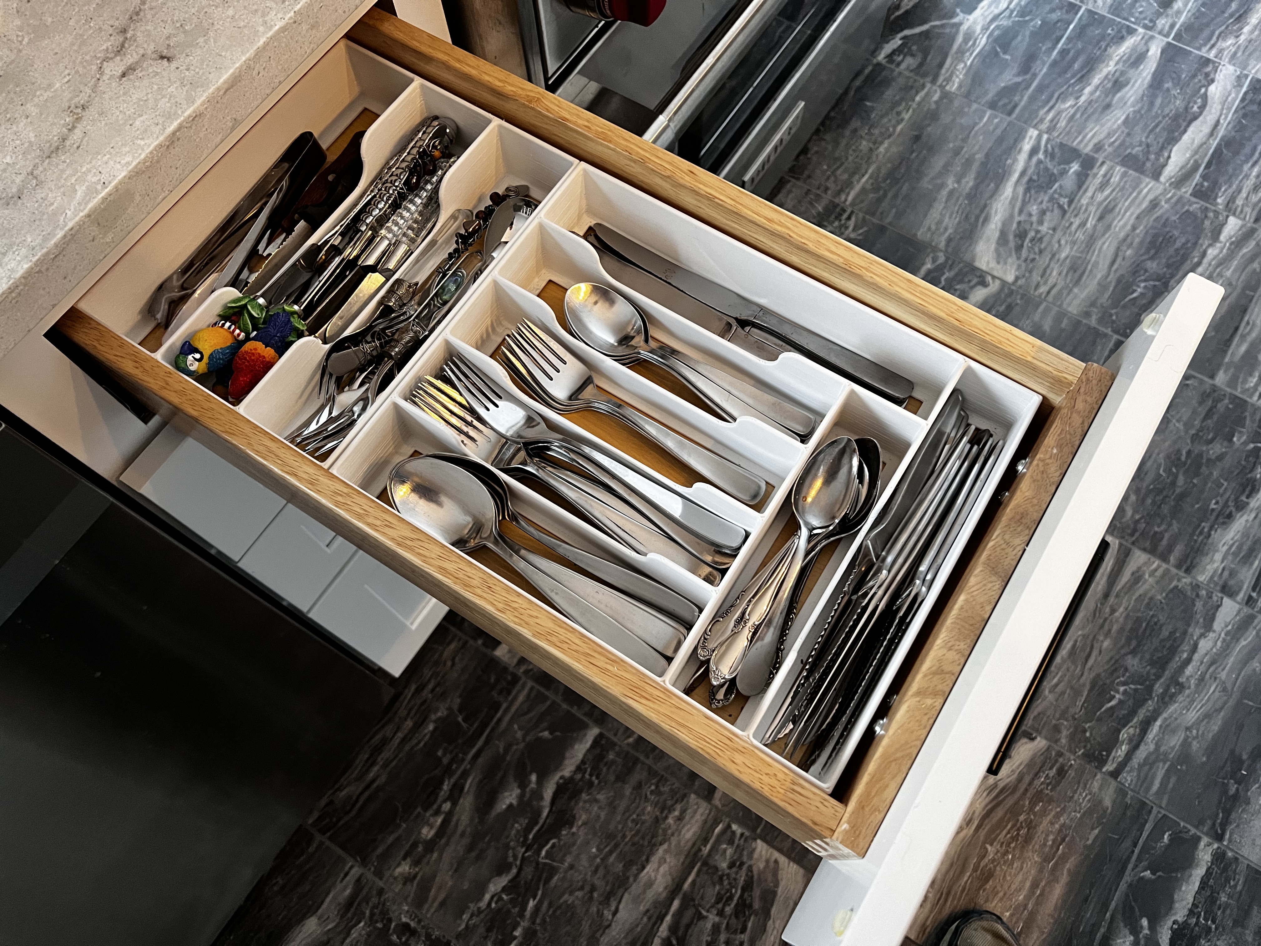 Two silverware drawer organizers 12" x 9.7" and 7.5” x 9.7”