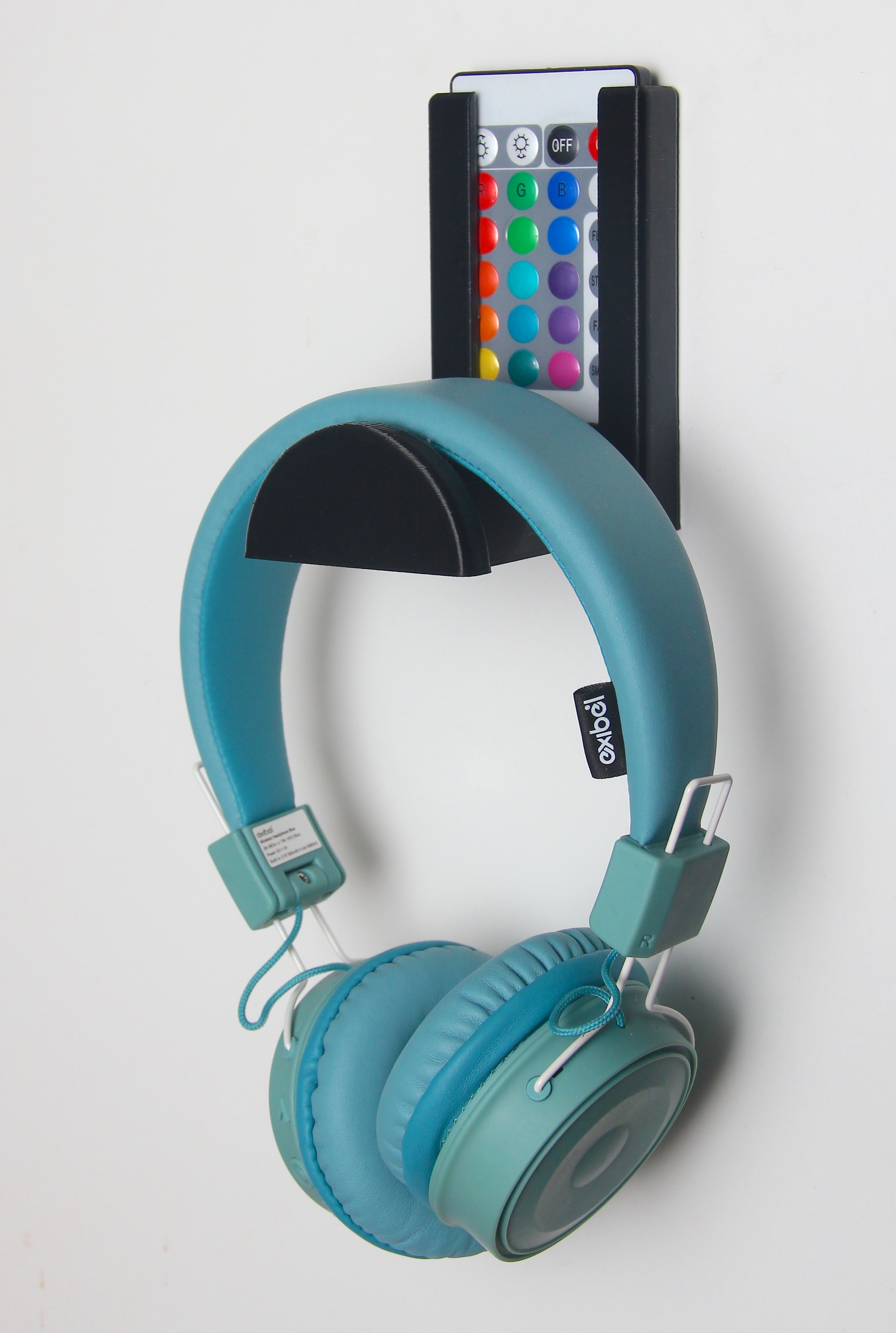 Combined LED remote- and headphone holder