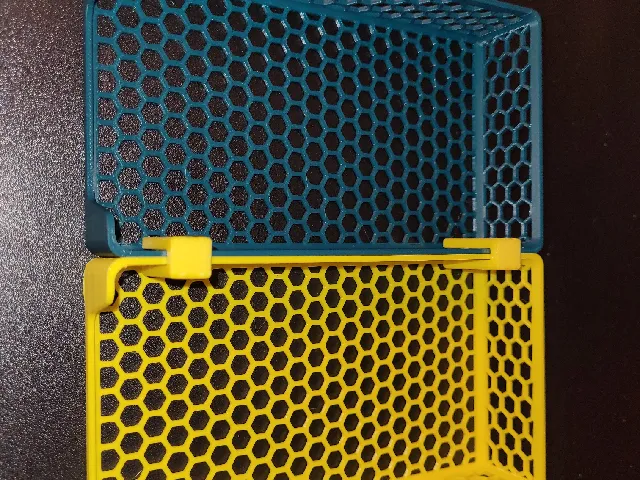 Several sized Organizers for drawers with hexagon walls and bottom as well as closed or open front and connector, sev