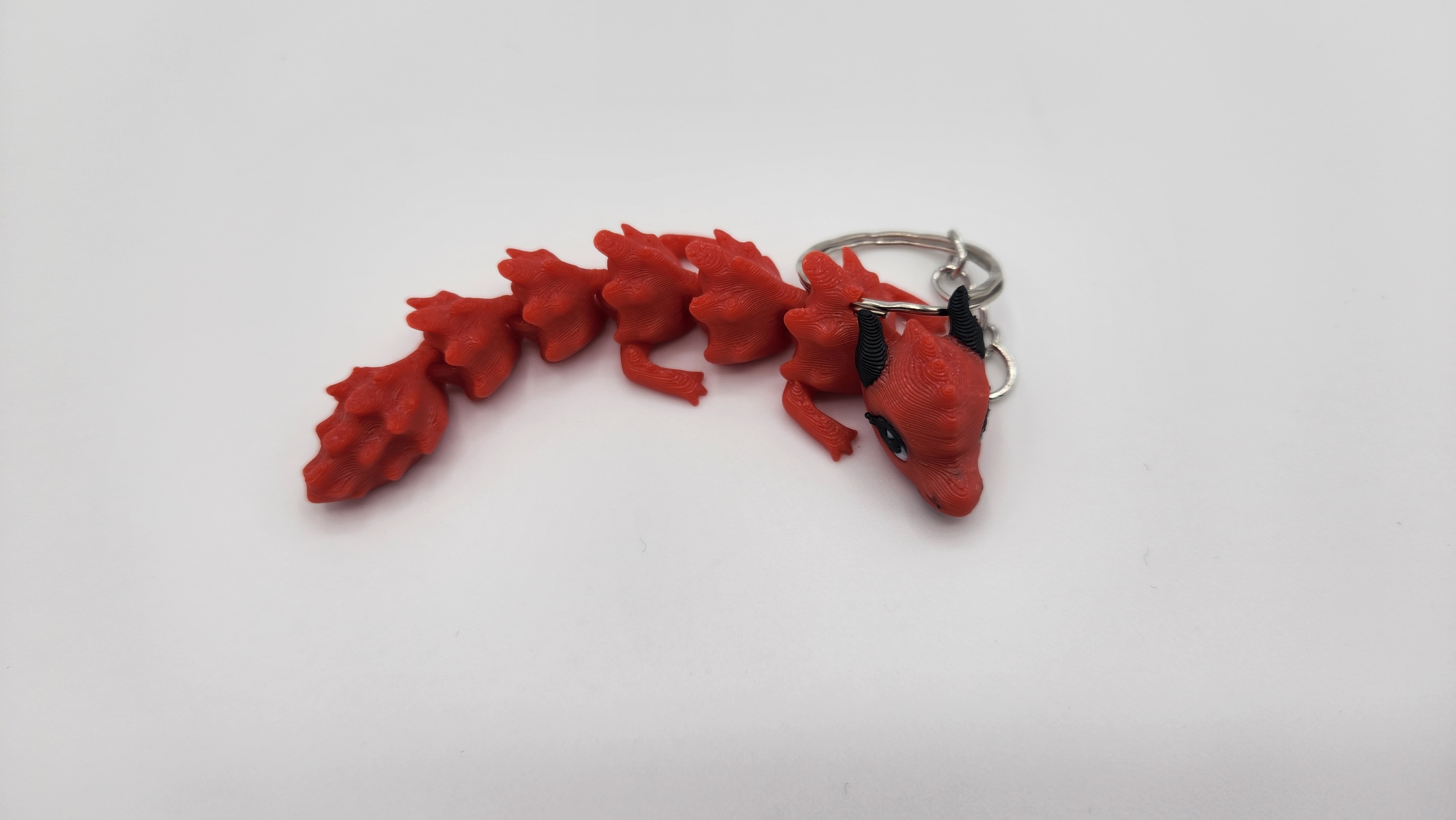 Miniatura 3 do modelo 3D FLEXI CUTE DRAGON KEYCHAIN