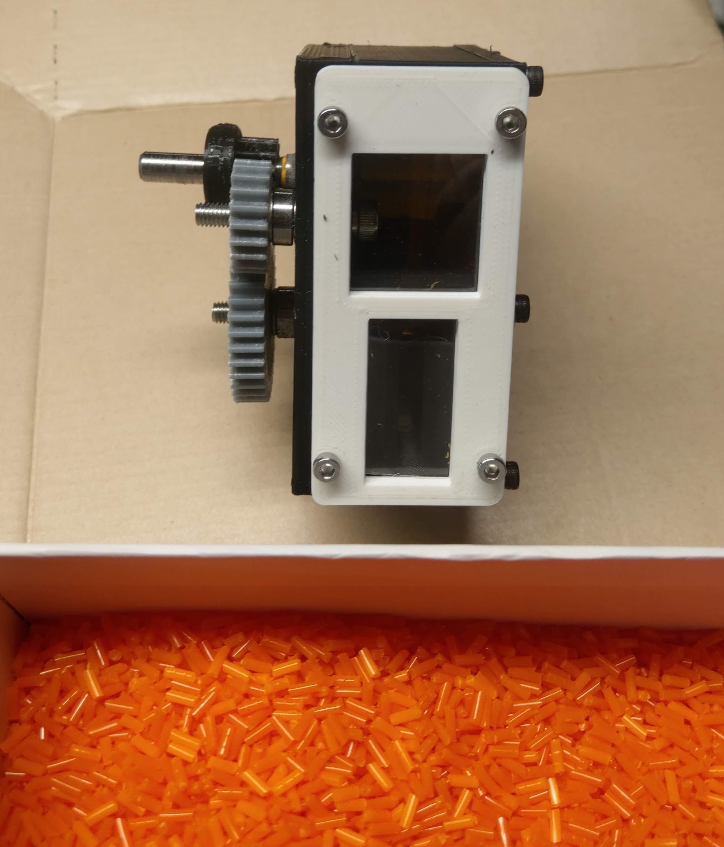 Self feeding open source filament pelletizer with PET plastic bottle for window