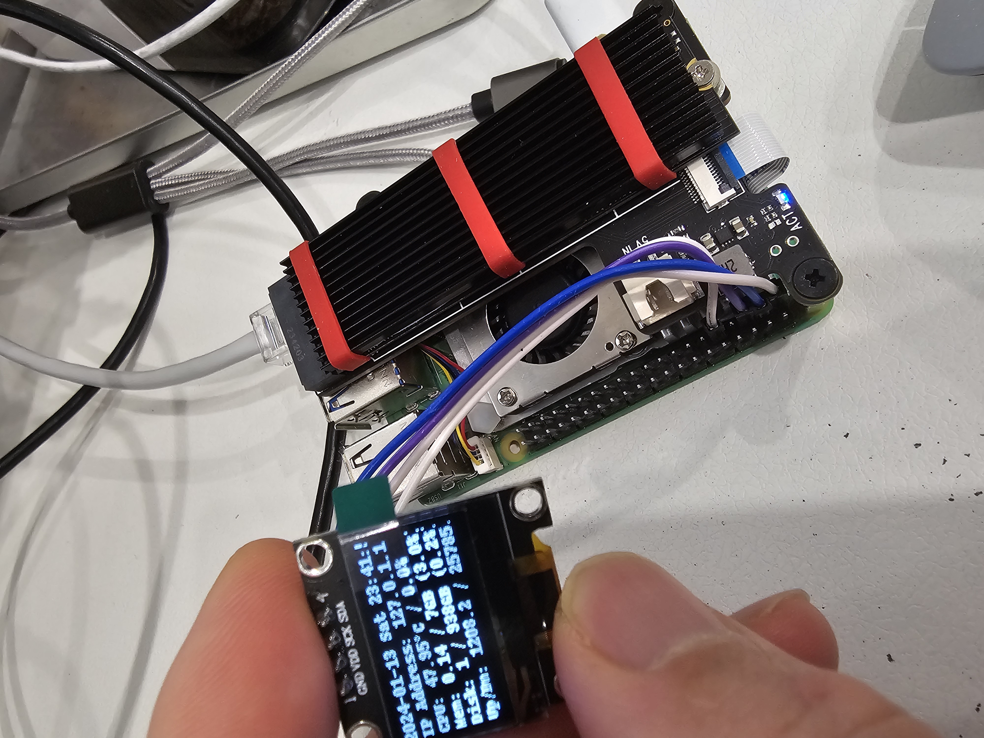 raspberrypi5 + x1001(nvme adapter) case + ssd1306 case(+ cc2652p)