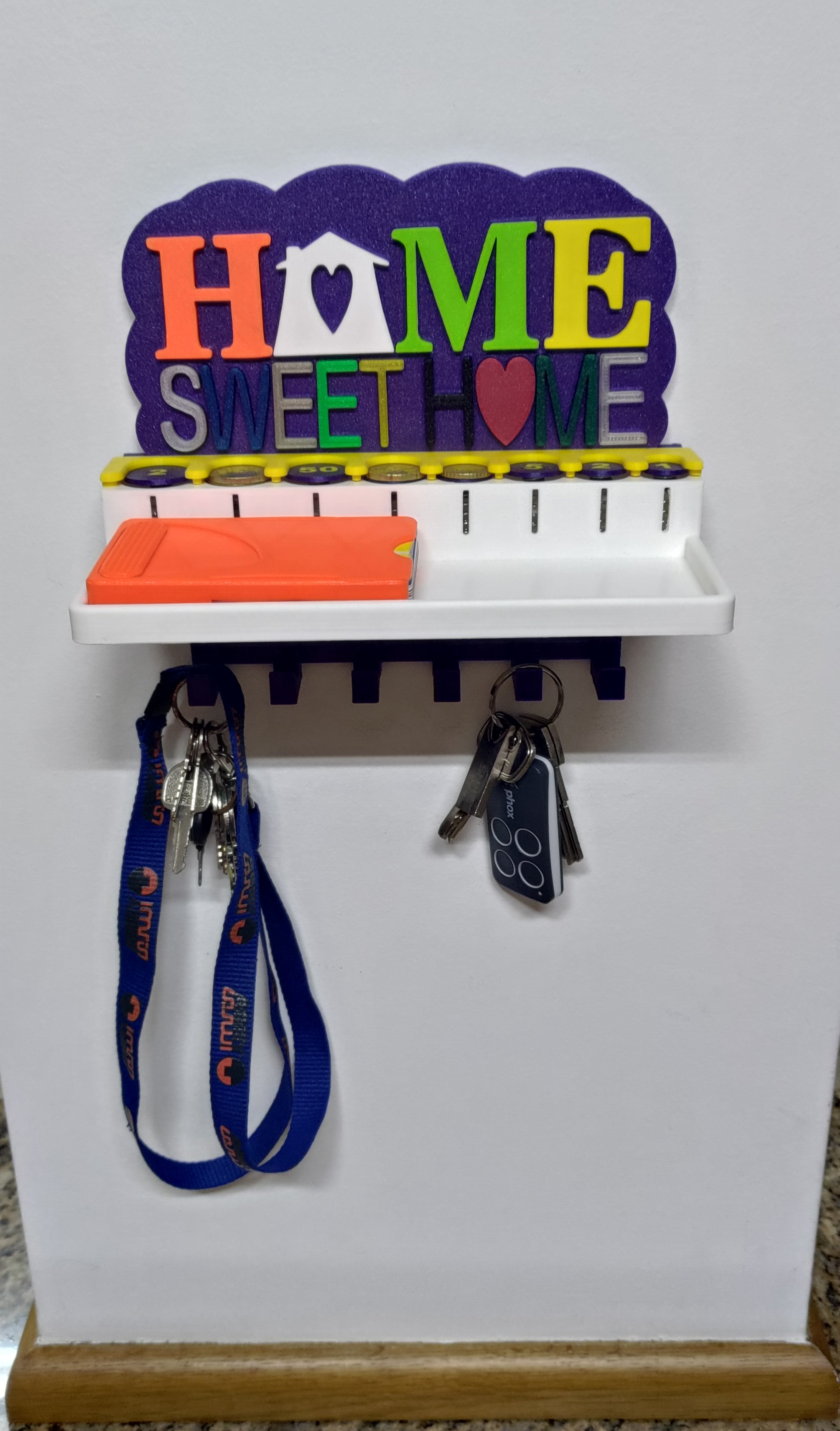 Key Holder with coin dispenser