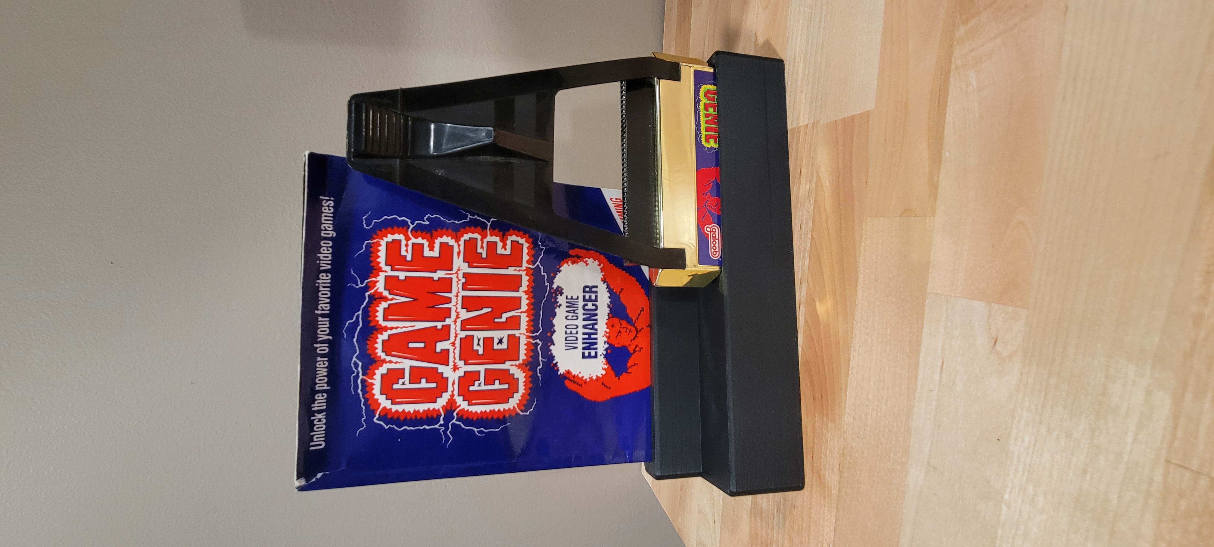 Nintendo NES Game Genie Display Stand