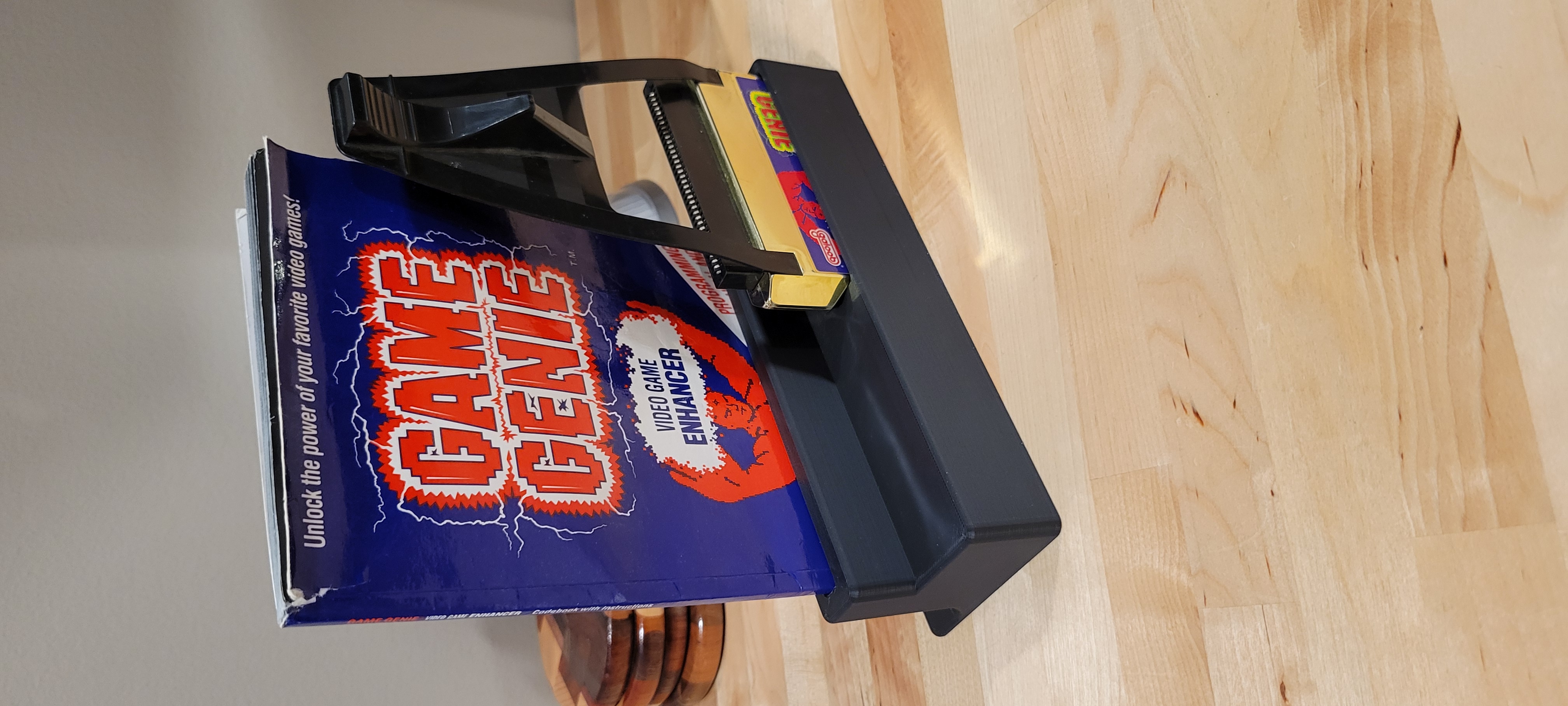 Nintendo NES Game Genie Display Stand by SUGAFREE | Download free STL model  | Printables.com