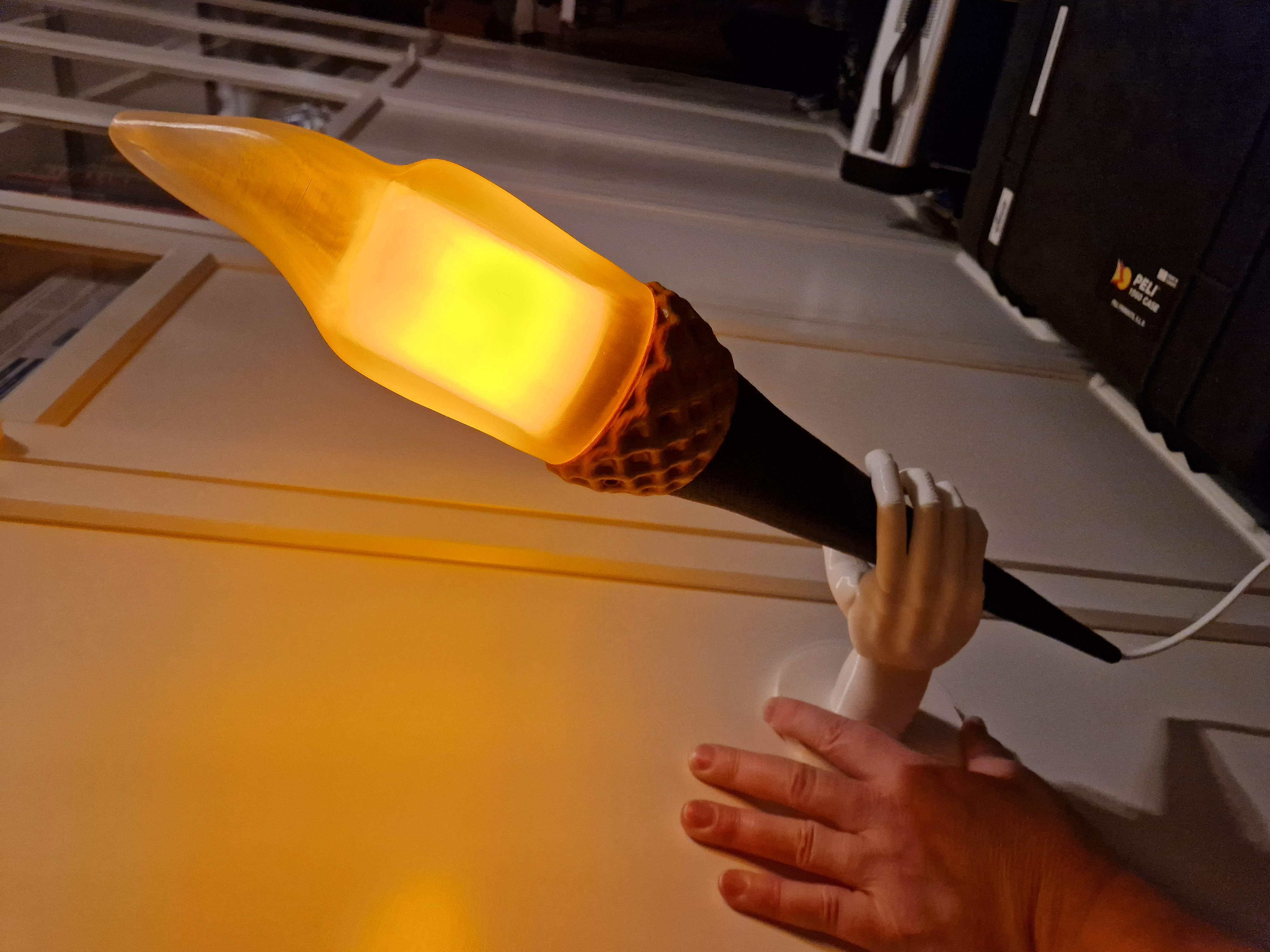 Torch holder hand