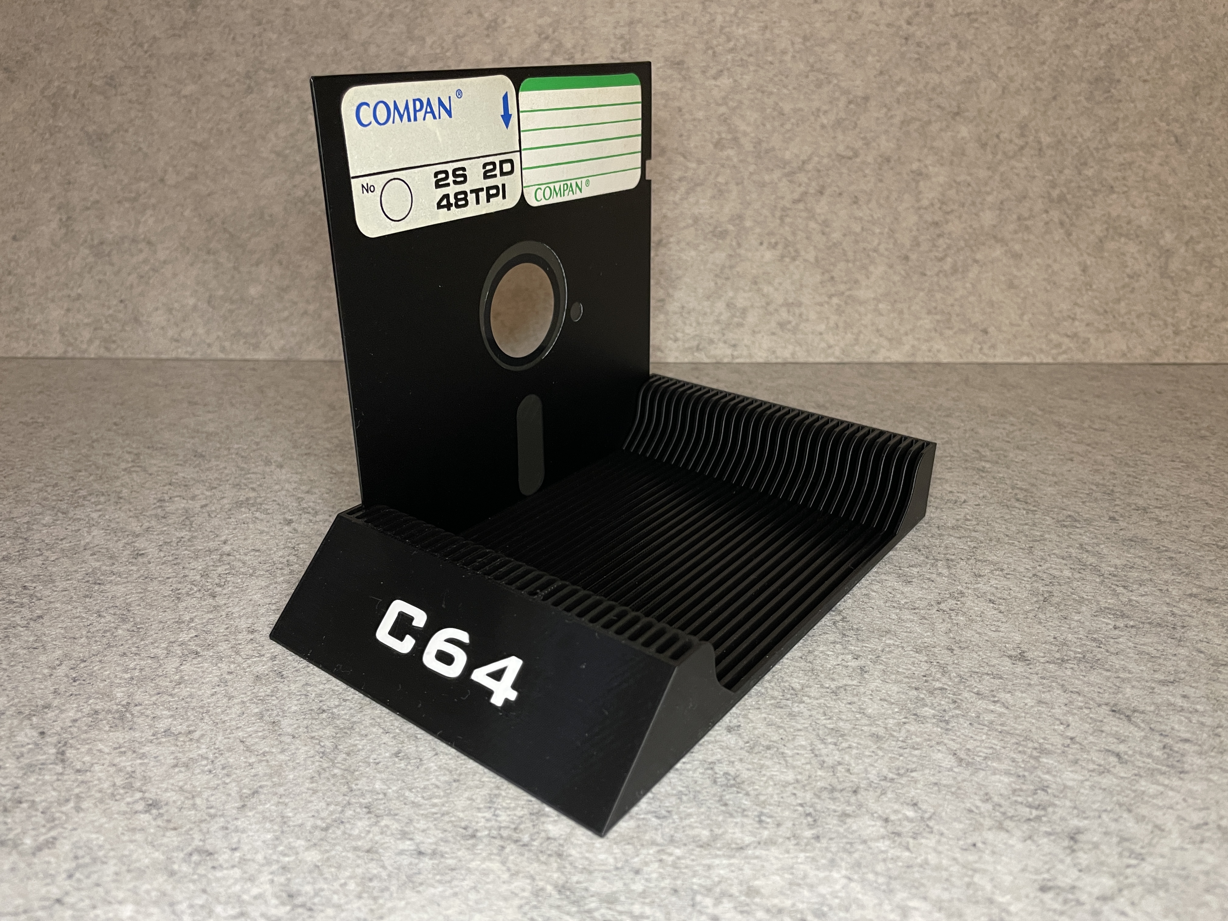Stand holder for Commodore64 floppy discs C64