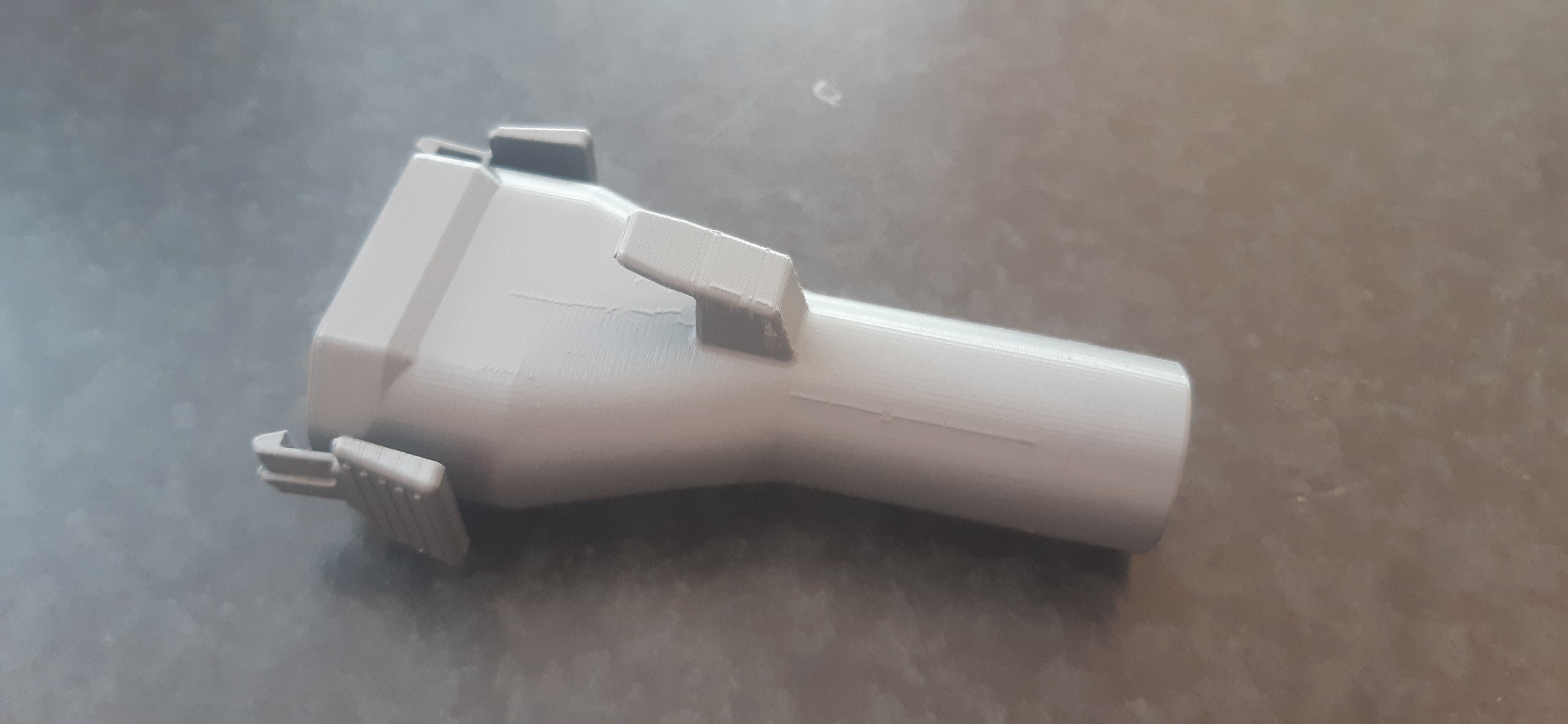 A Converter Duct For A Bosch Orbital Sander.