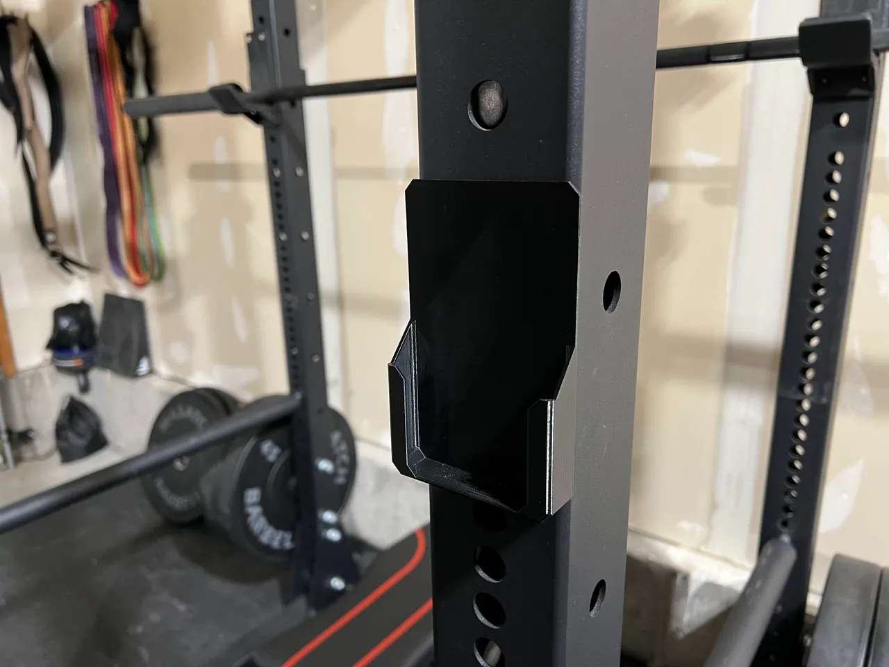 Squat rack best sale phone mount