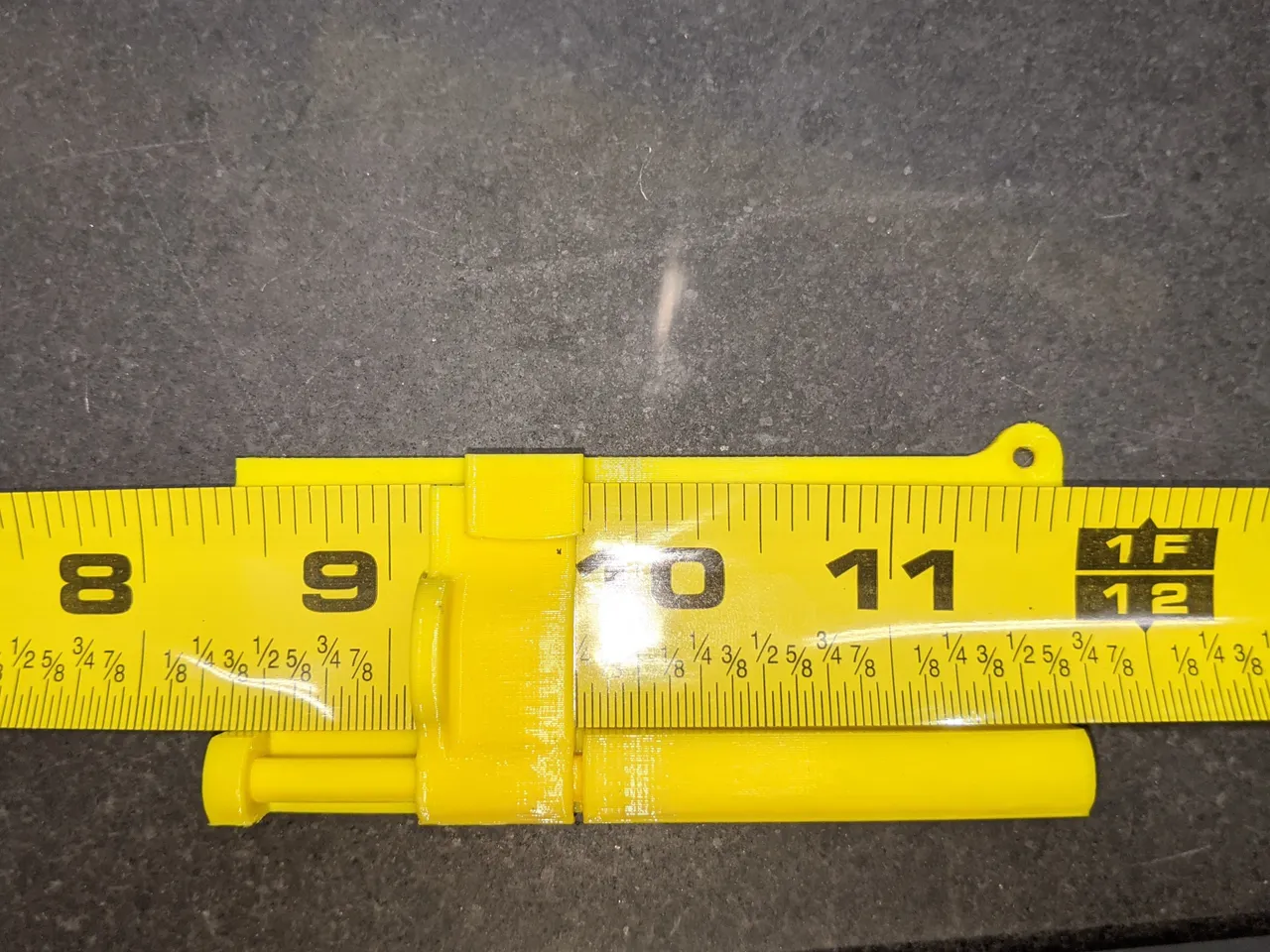 4.7 inches on store a tape measure