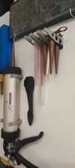 Soporte para pistola de silicona