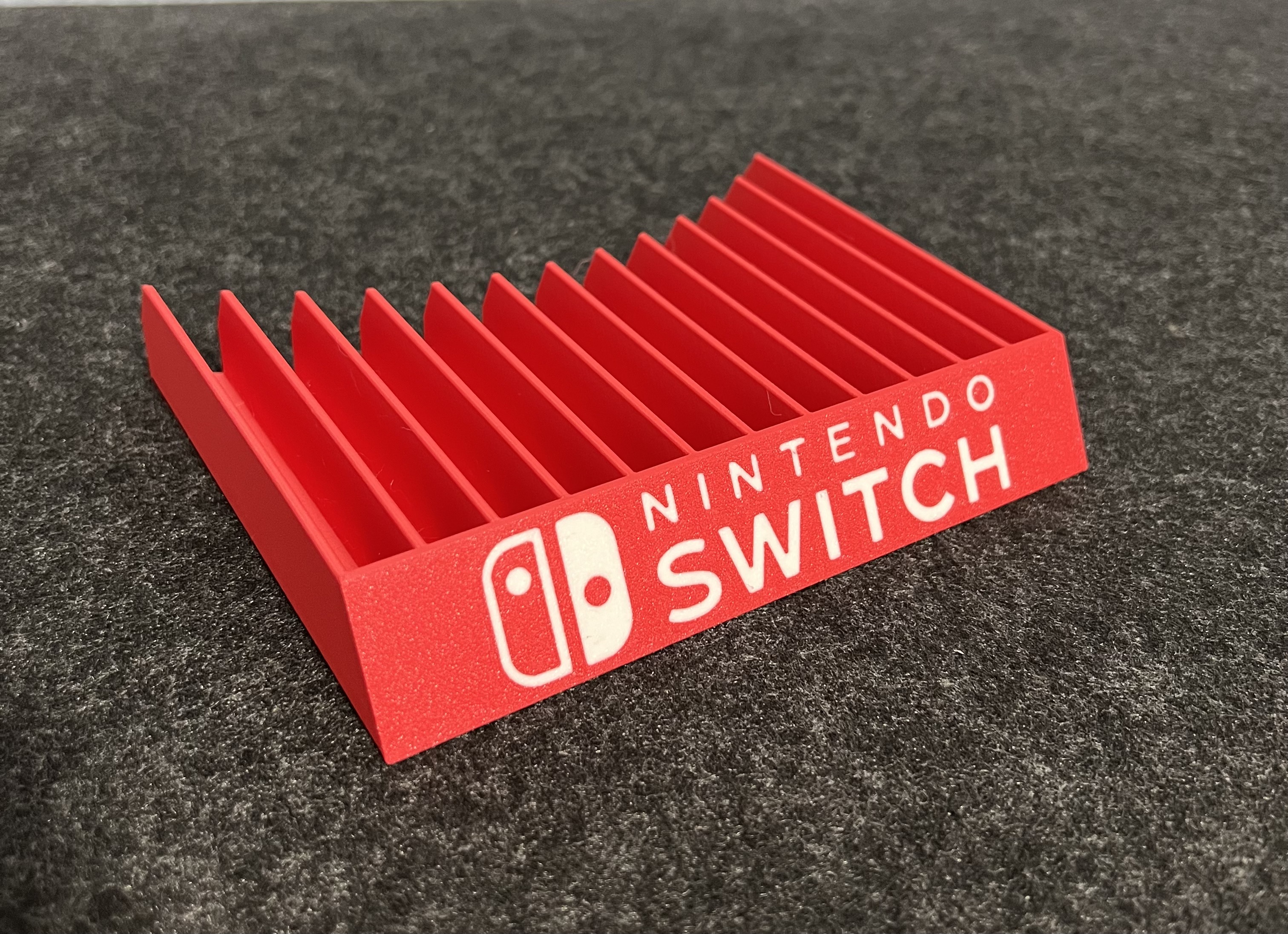 Nintendo Switch game holder with embedded logo by Sven Download free
