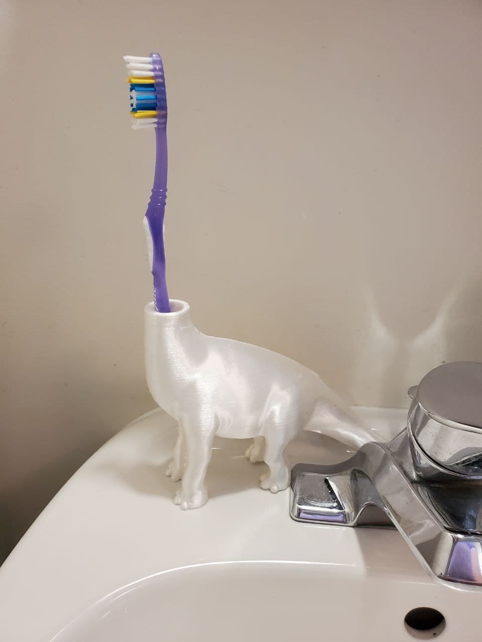 Dinosaur toothbrush holder merged