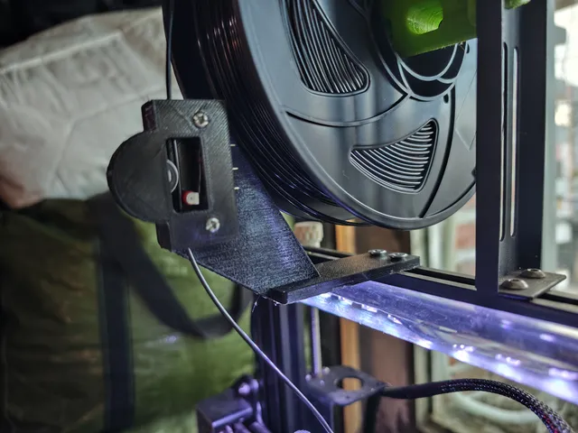 Filament guide and sensor