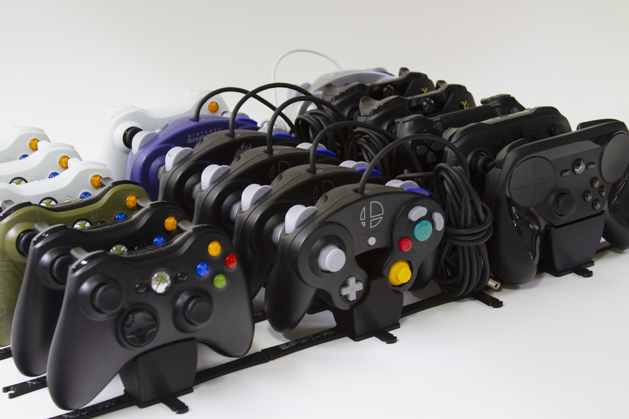 Modular controller stands for multiple consoles