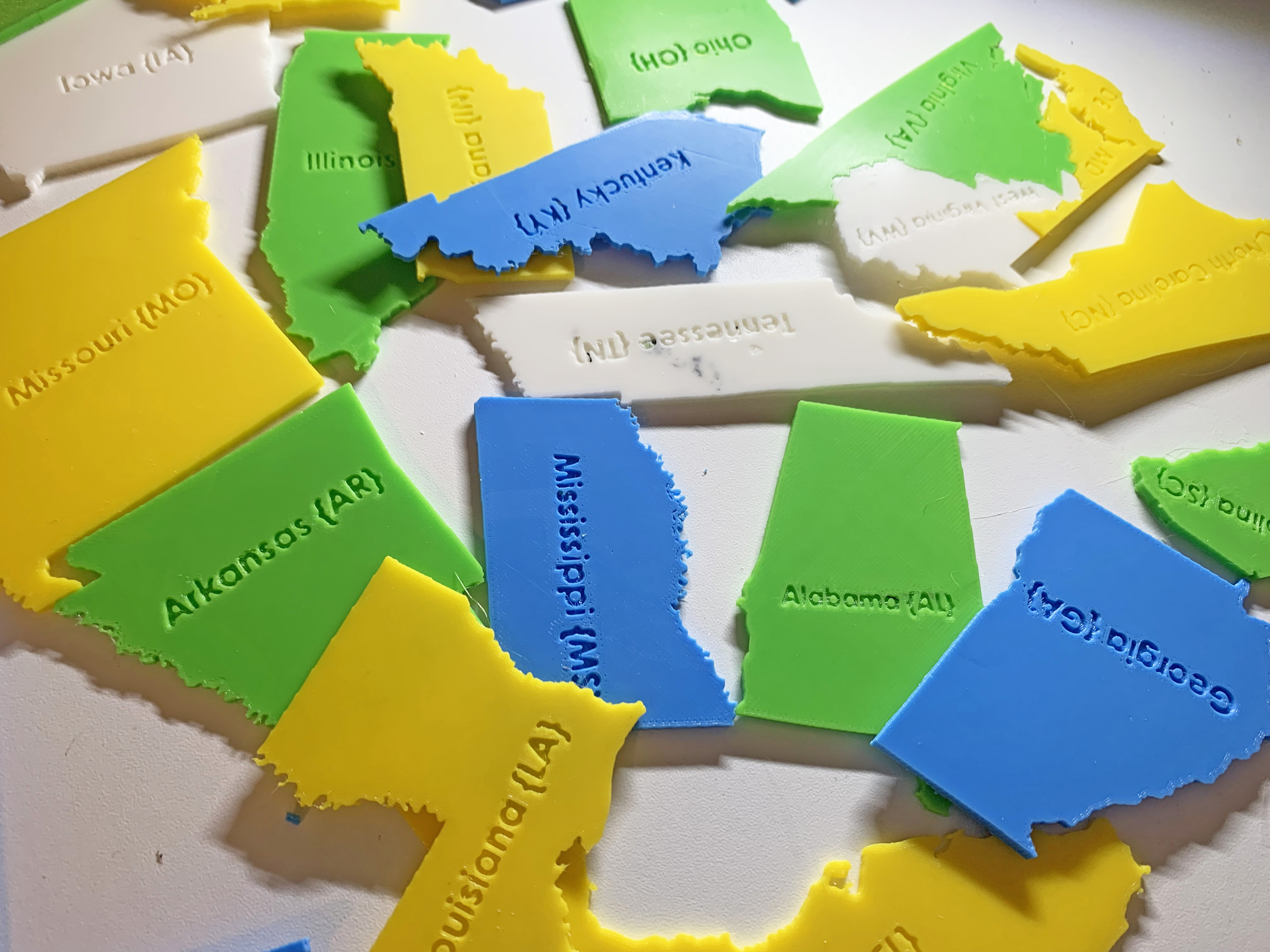 State Names to emboss the back of the USA topographical Puzzle Pieces