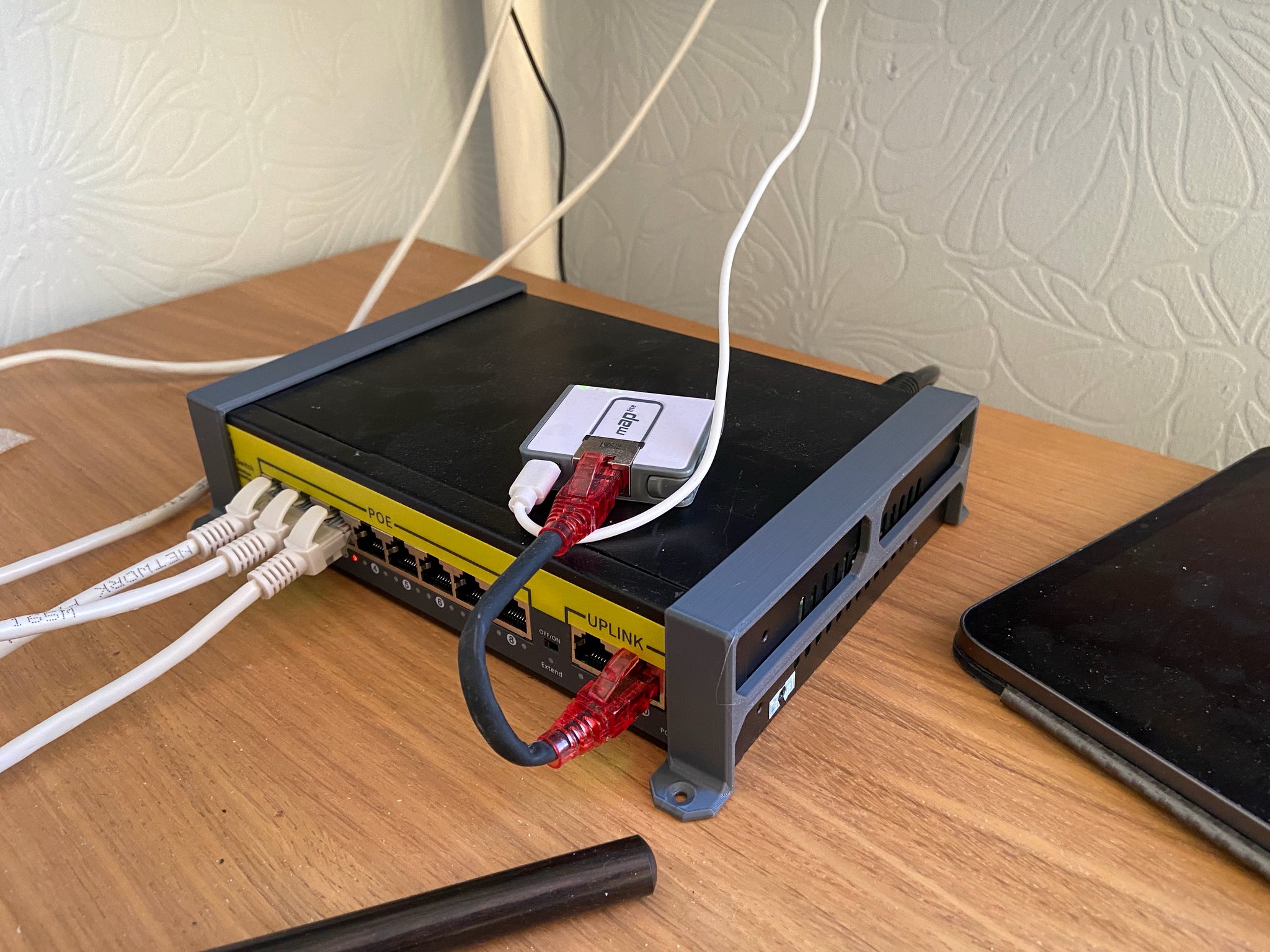 POE switch holder for flat surface mount