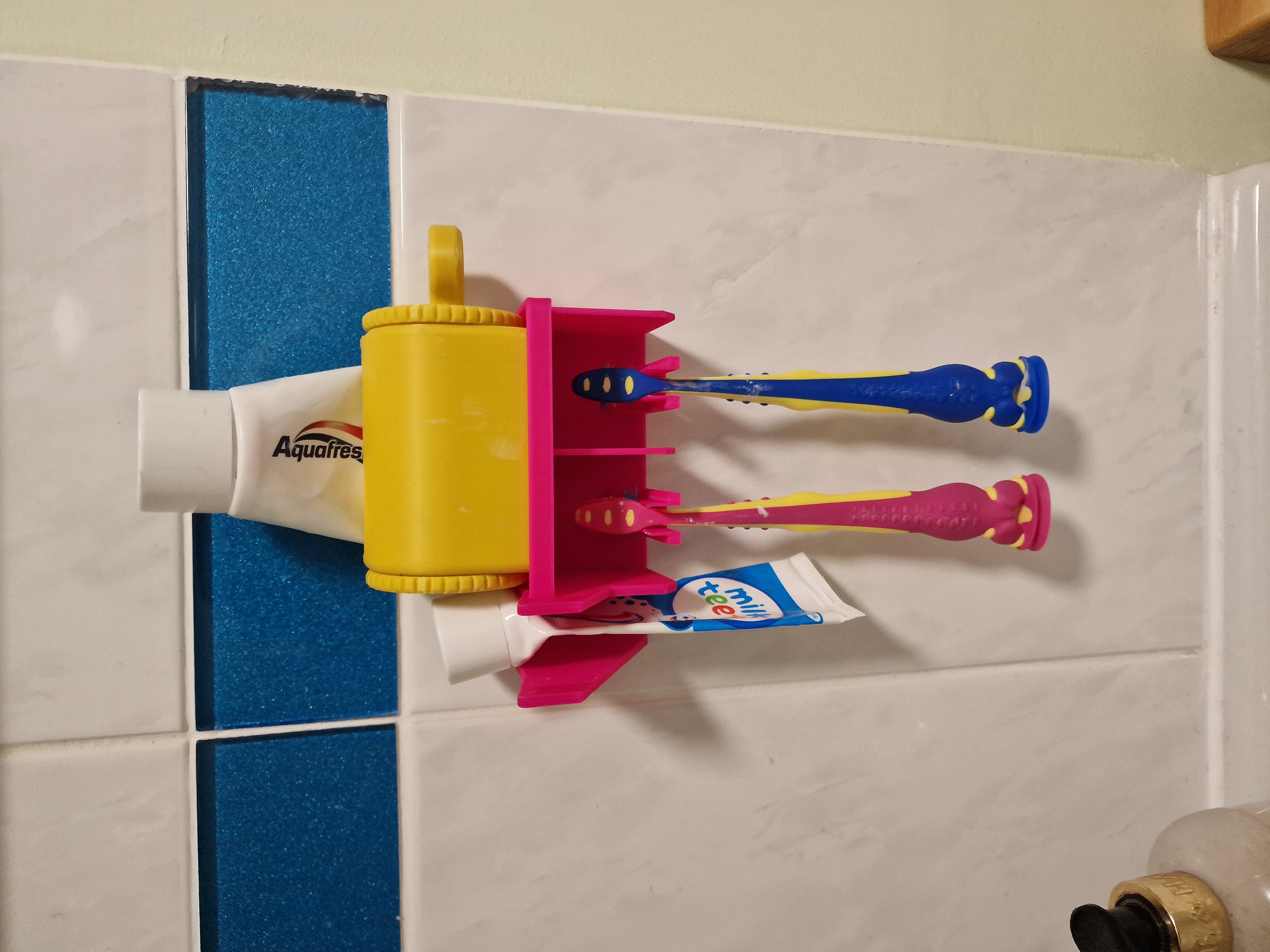 Two toothbrush and paste holder