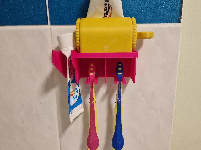 Two toothbrush and paste holder