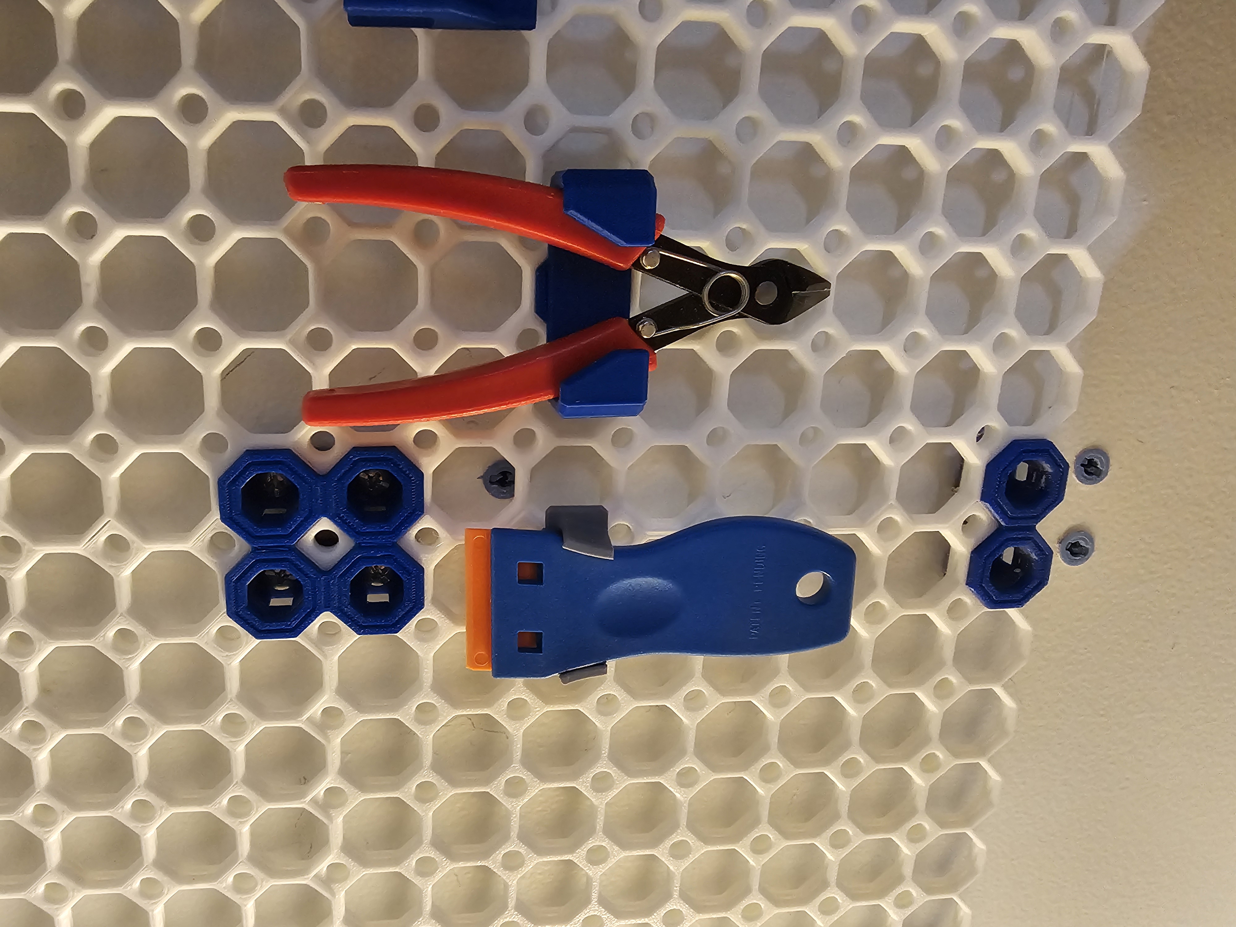 Plastic razor scraper holder