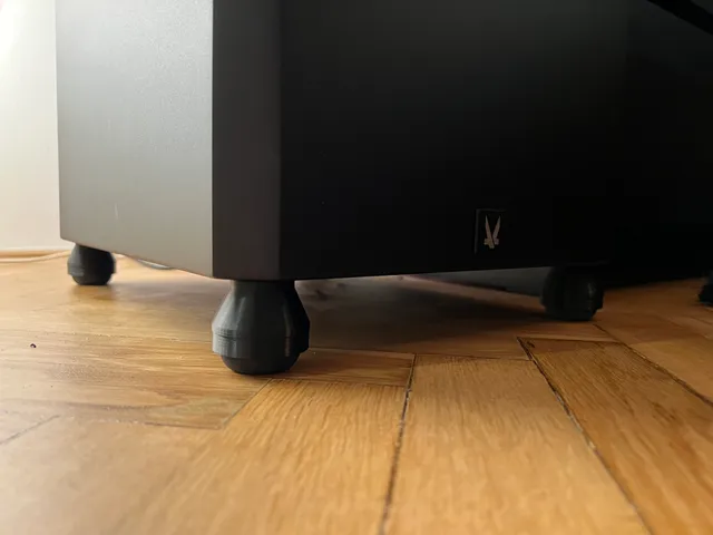 Subwoofer vibration isolators