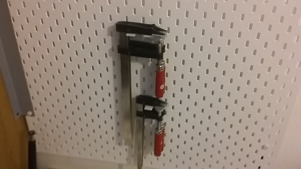 Wide hook for Skadis pegboard