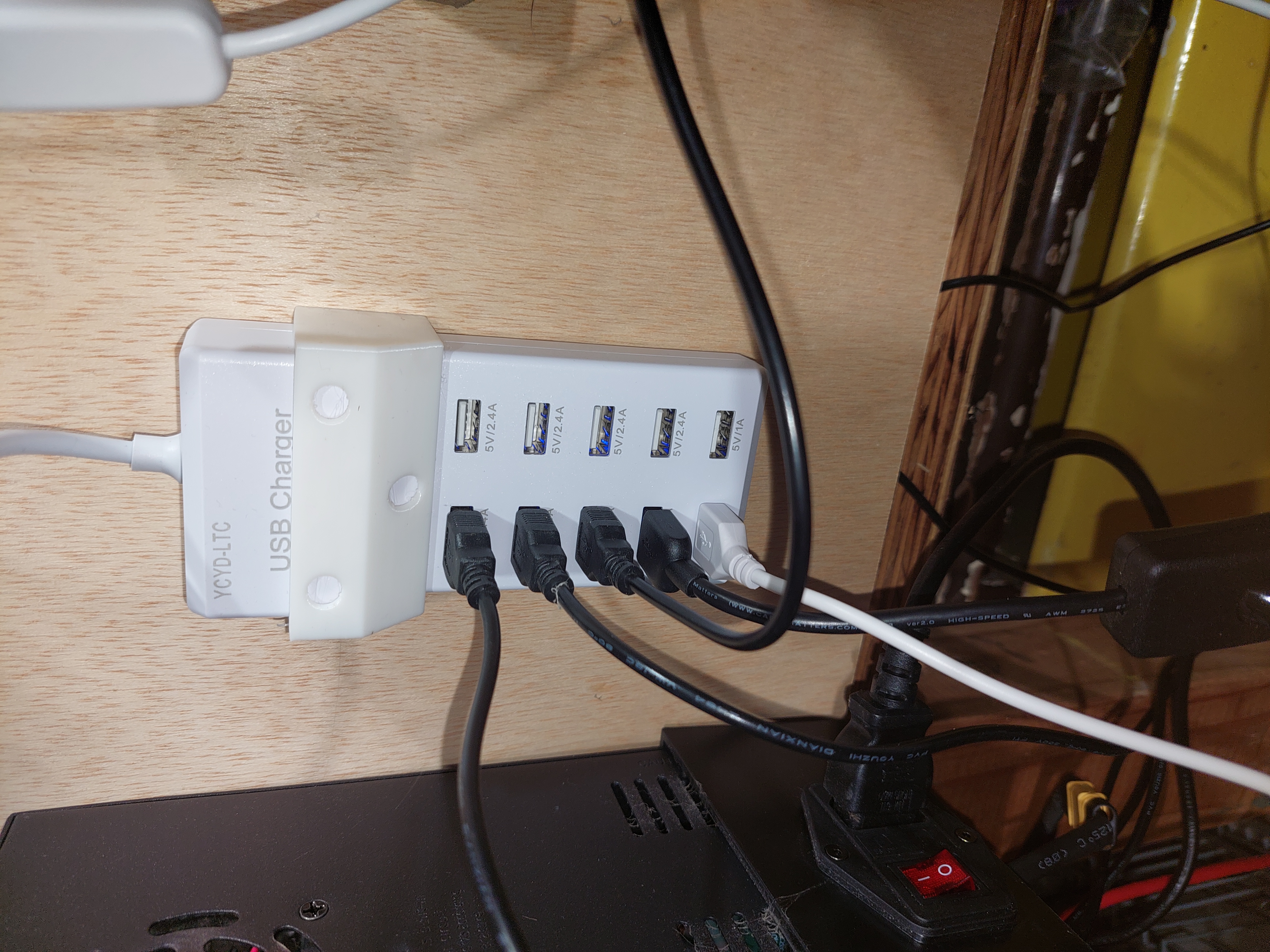 Wall bracket for USB power source.