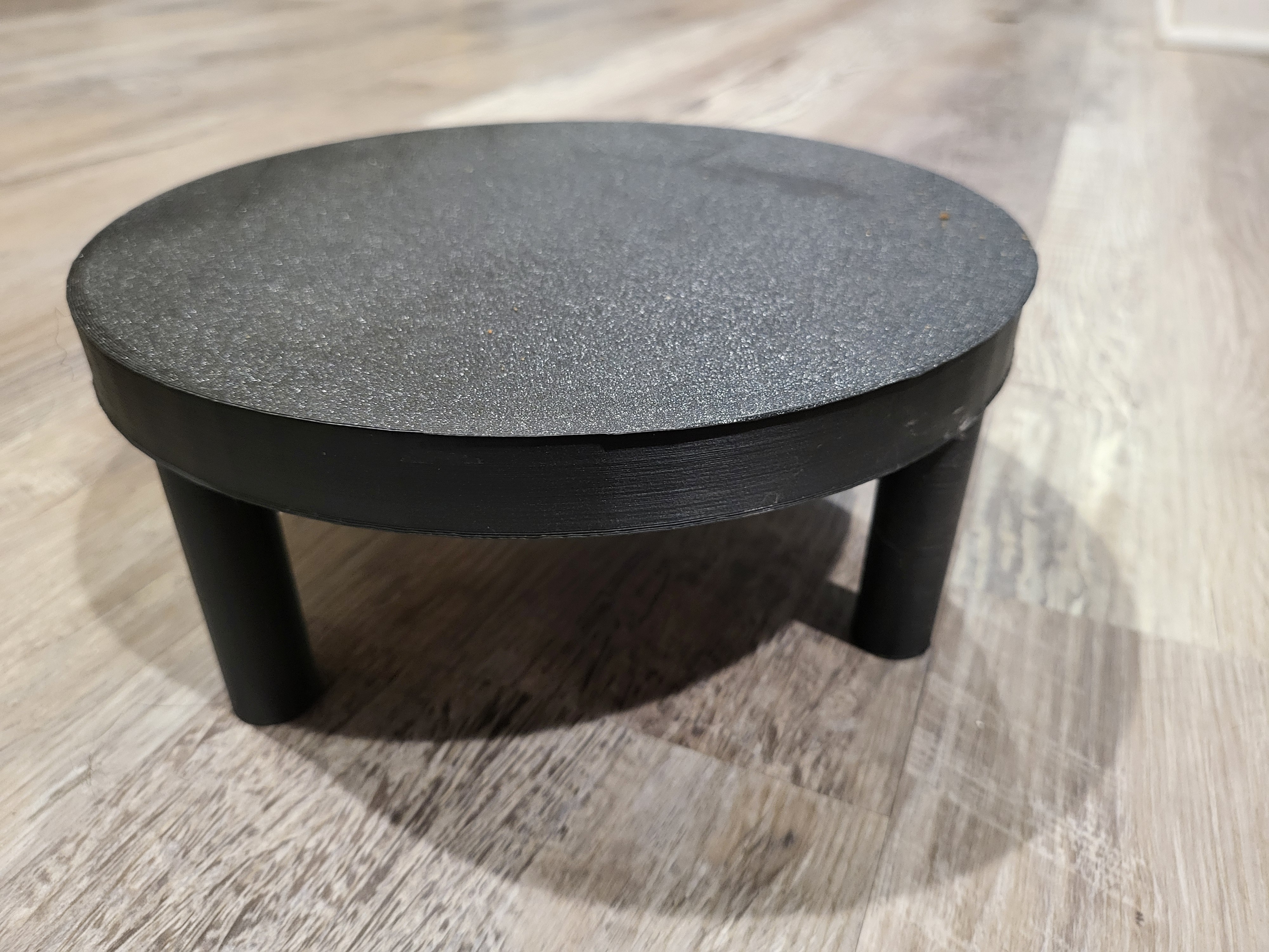 Automated pet feeder booster table