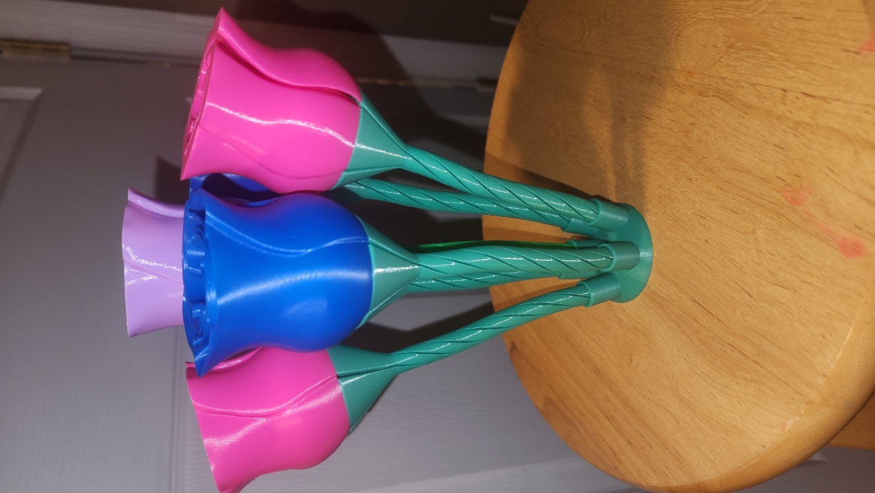 Vase rose stem base holder