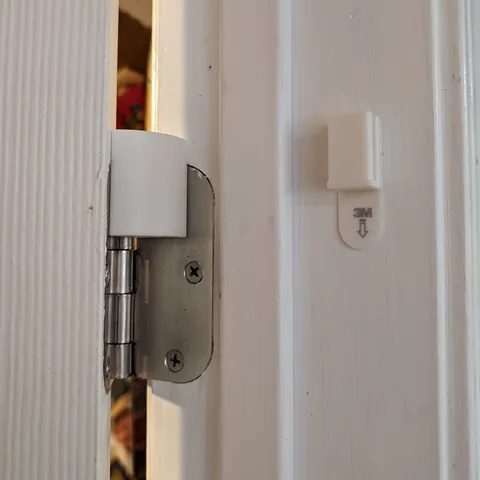 Hinge door stop storage hook