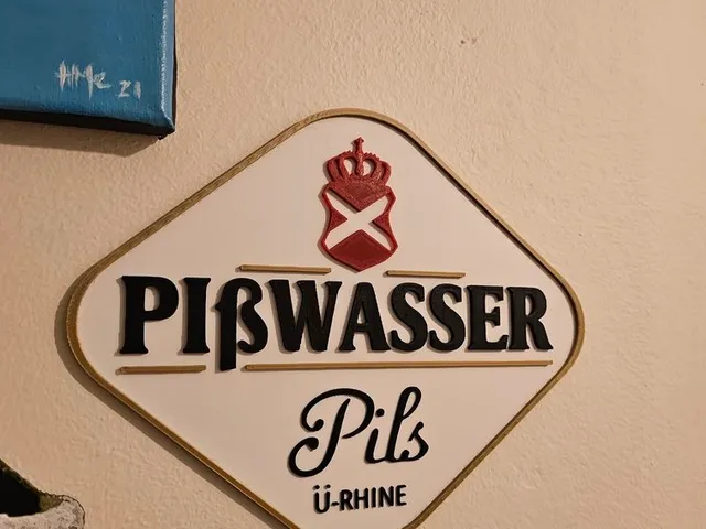 Pisswasser logo wall sign