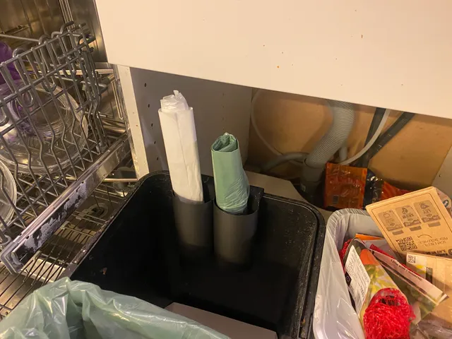 Plastic bag roll holder for IKEA garbage bins