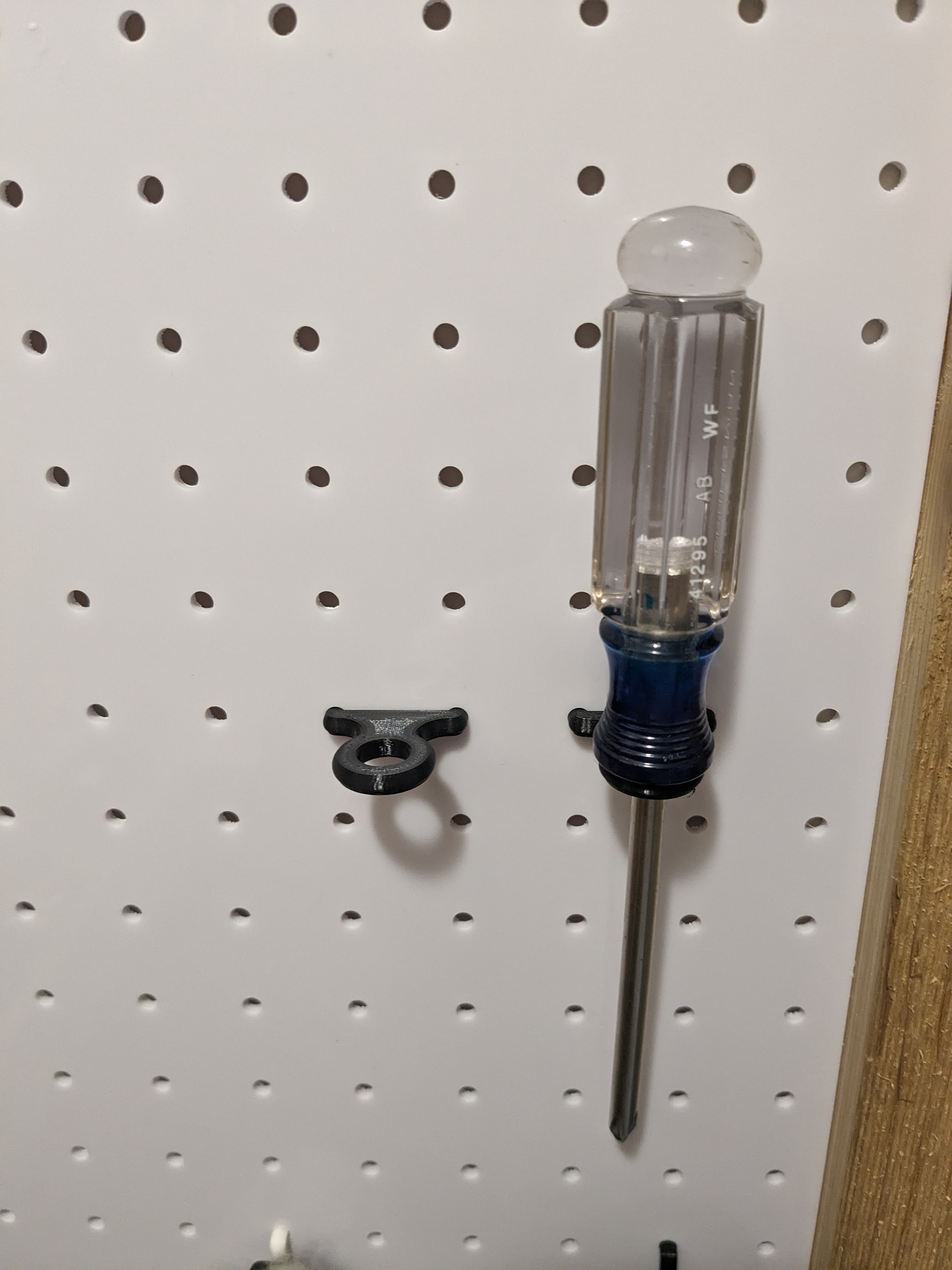 Pegboard screwdriver holder