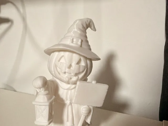 Halloween Kürbis-Hexe mit Laterne und Schild