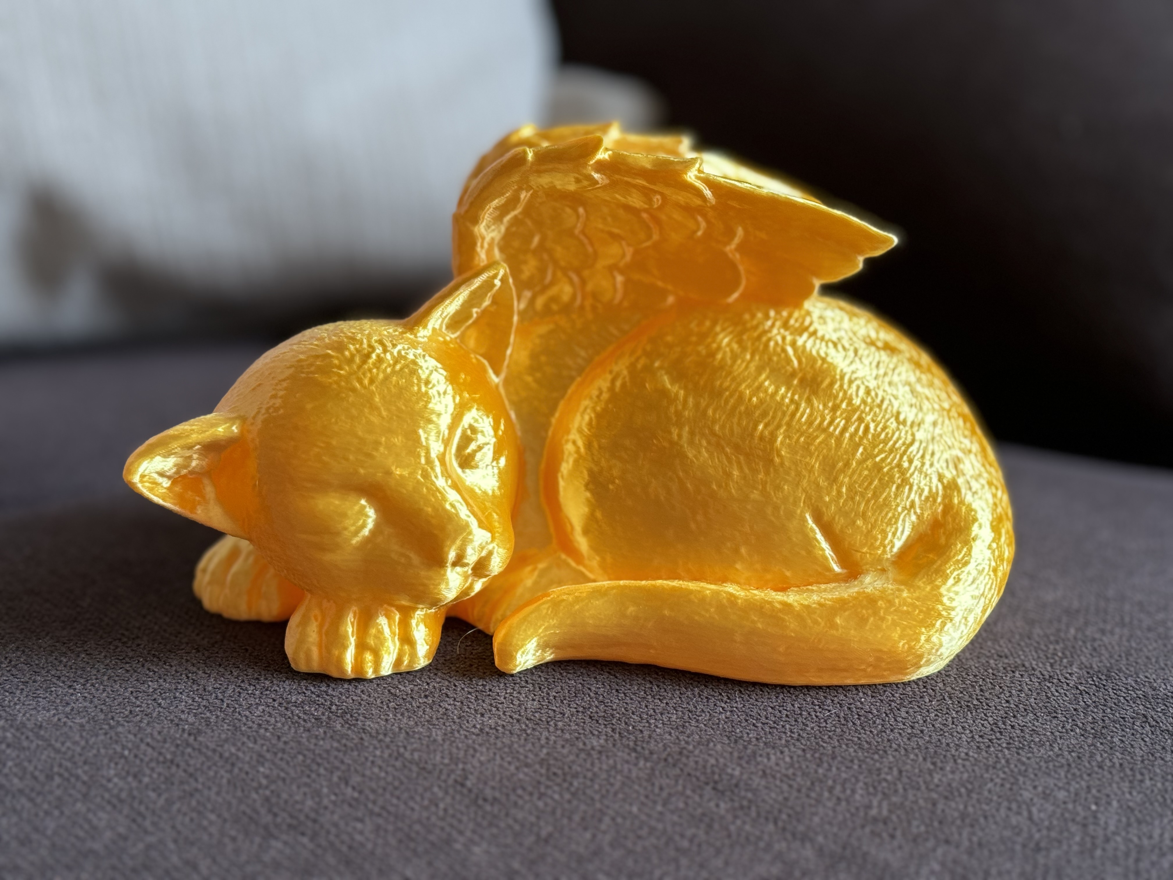 Sleeping Winged Cat